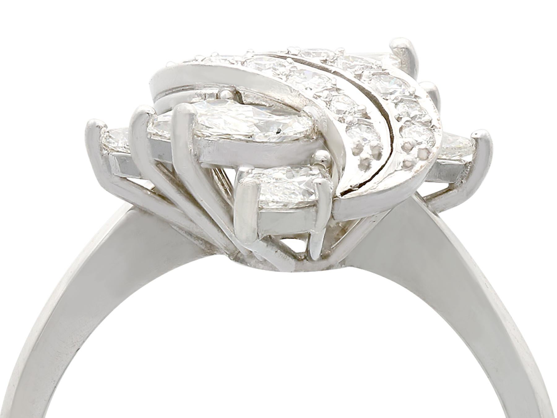 A stunning vintage 1950s 2.19 carat diamond and platinum twist style dress ring; part of our diverse diamond jewelry and estate jewelry collections.

This stunning, fine and impressive vintage ring has been crafted in platinum.

The pierced