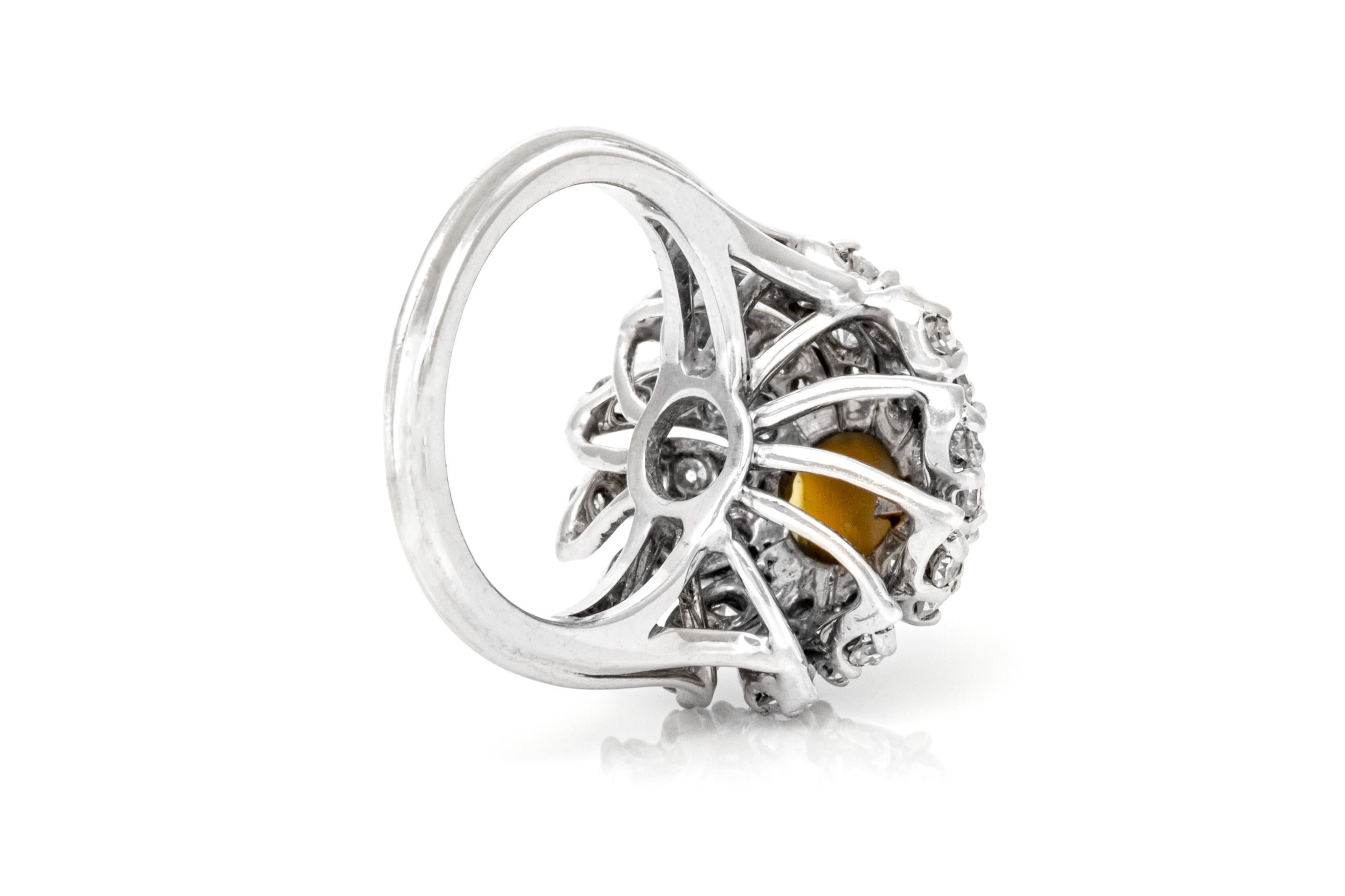 Vintage 1950s 2.50 Carat Cat's Eye and 2.00 Carat Diamond Cocktail Ring In Good Condition For Sale In New York, NY