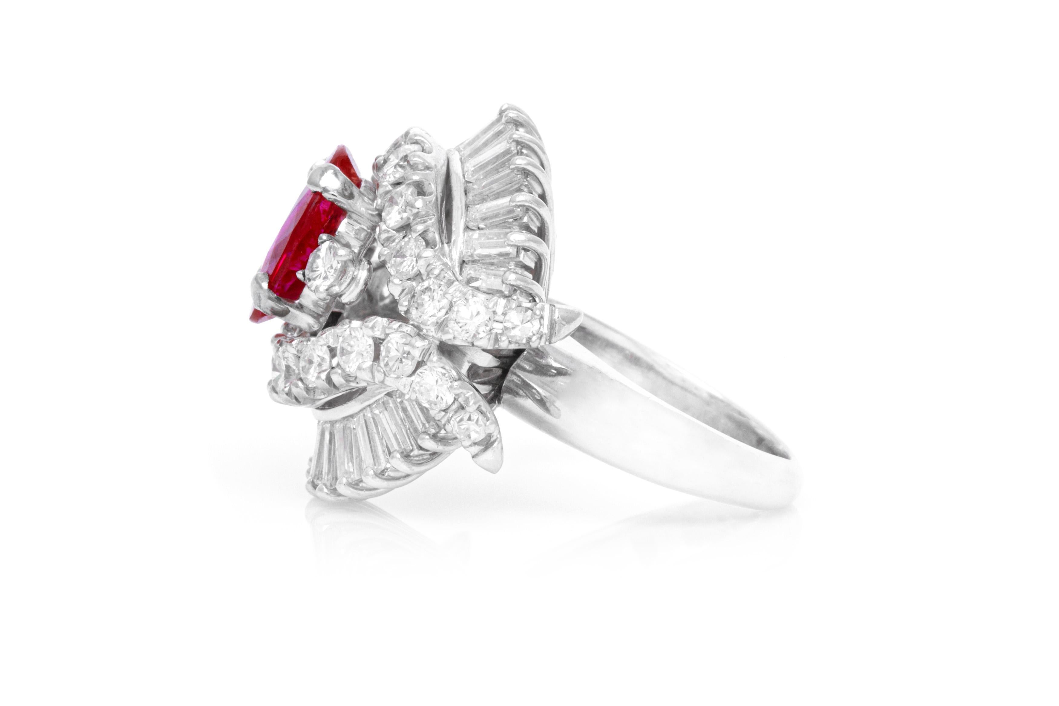 Finely crafted in platinum with an Oval cut Ruby weighing approximately 2.68 carats, accented by Round Brilliant and Baguette cut Diamonds weighing a total of approximately 3.50 carats.
Circa 1950s
Size 4 1/2, resizable