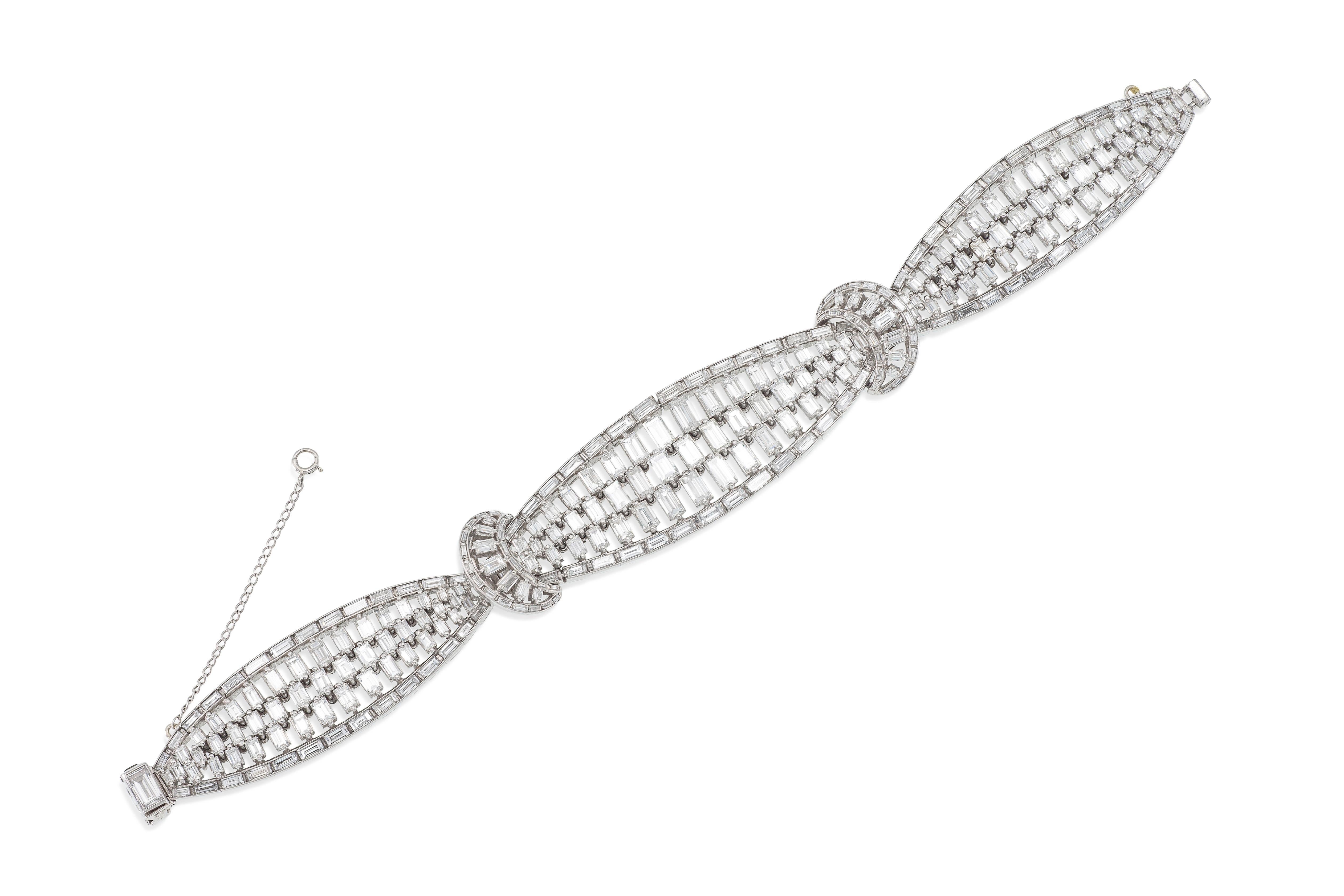 Finely crafted in platinum with Baguette cut Diamonds weighing a total of approximately 38.00 carats.
Circa 1950s
Size 7 inches