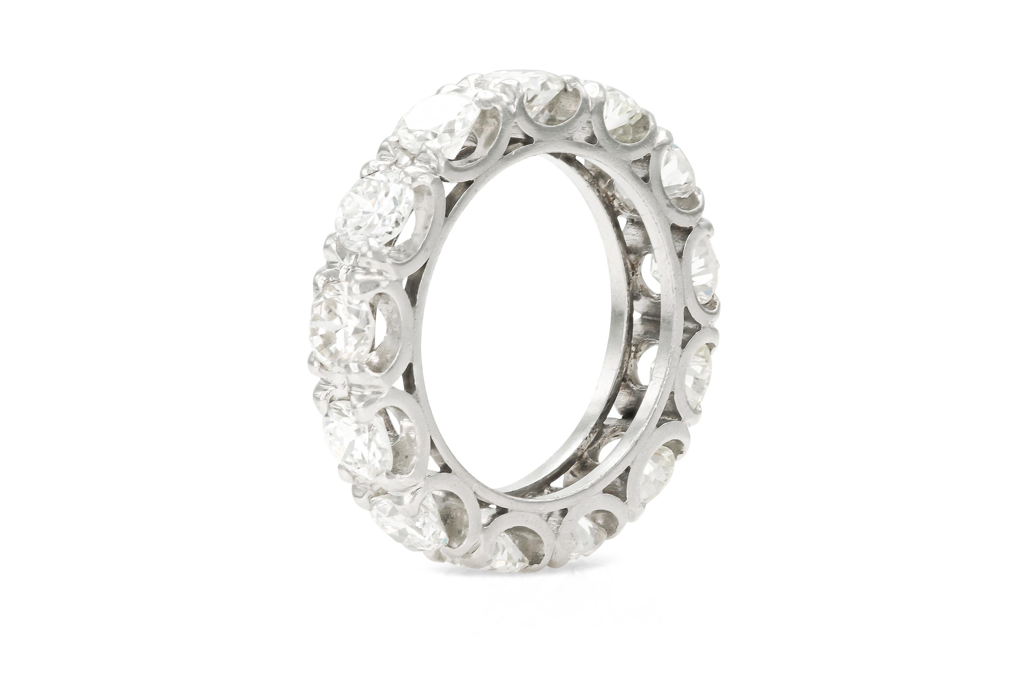 Finely crafted in platinum with 13 Round Brilliant cut Diamonds weighing a total of approximately 4.00 carats.
4mm wide
Circa 1950s
Size 5 1/2