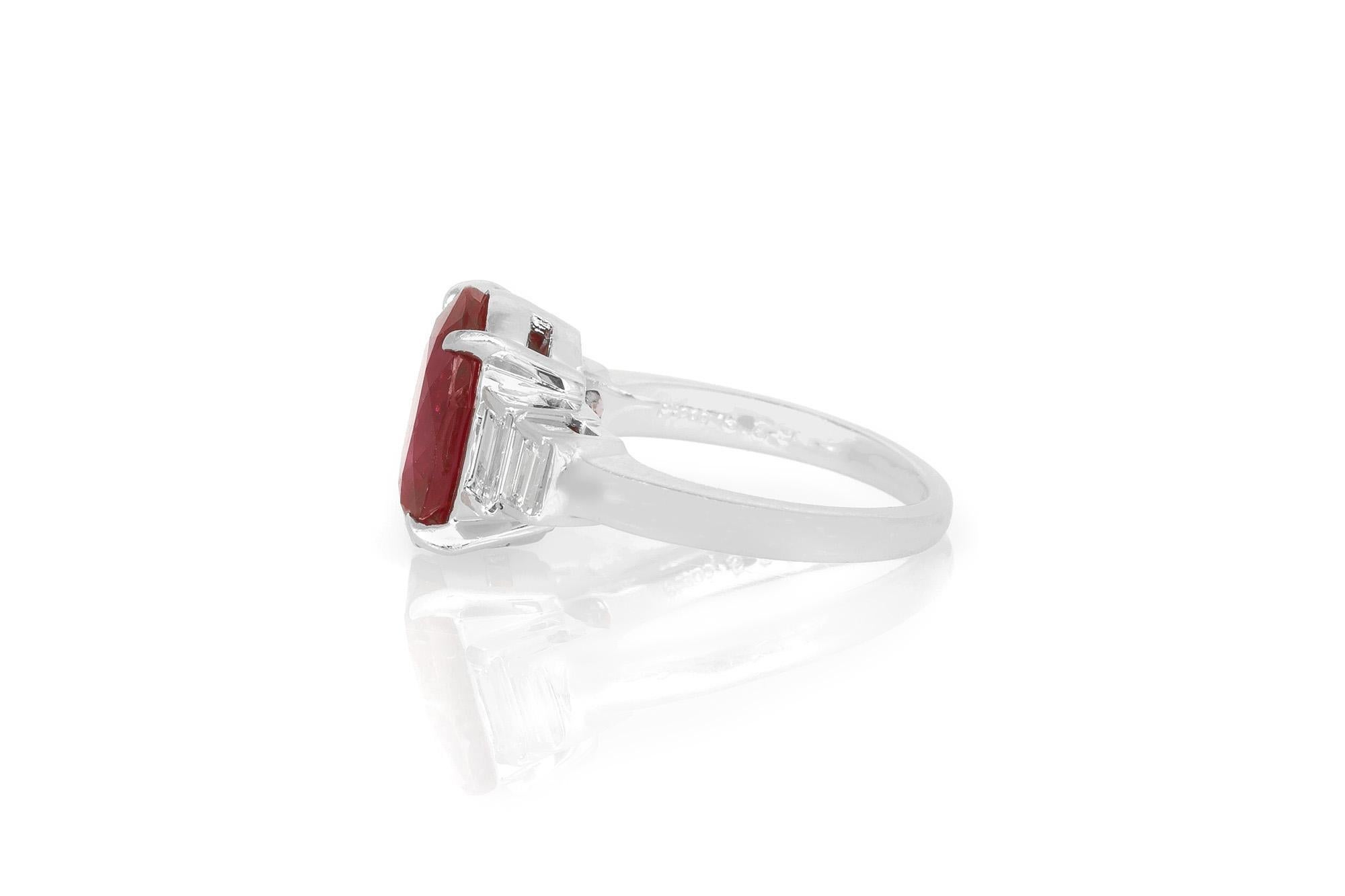 Vintage 1950s 5.39 Carat Oval Cut Ruby and 0.50 Carat Diamonds Ring In Good Condition For Sale In New York, NY