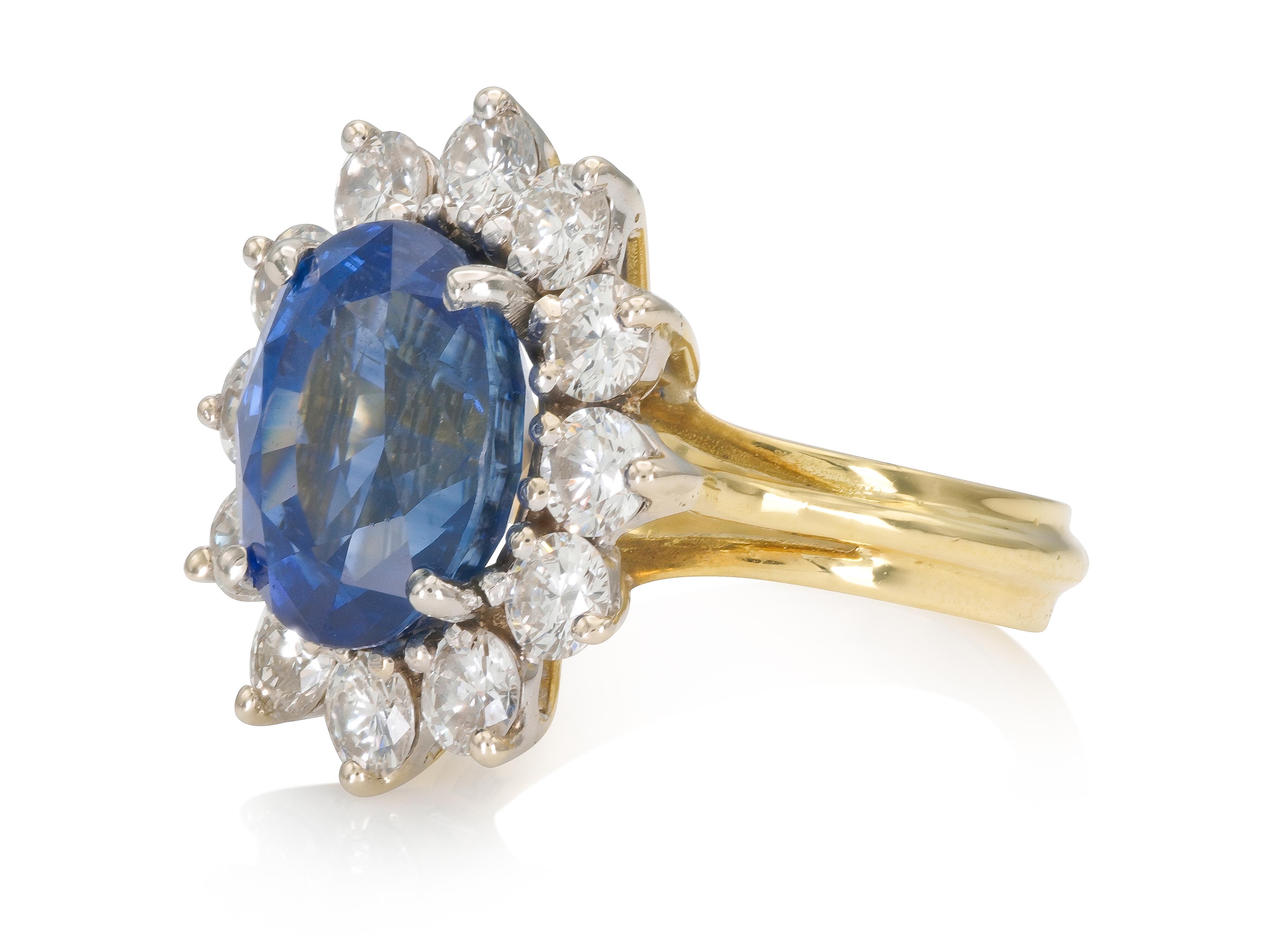 Finely crafted in 18k yellow gold and platinum with an AGL certified, Ceylon origin, Oval cut Sapphire weighing 6.21 carats, and 12 Round brilliant cut Diamonds weighing approximately a total of 1.50 carat, H-I color, VS1-VS2 clarity.
Circa