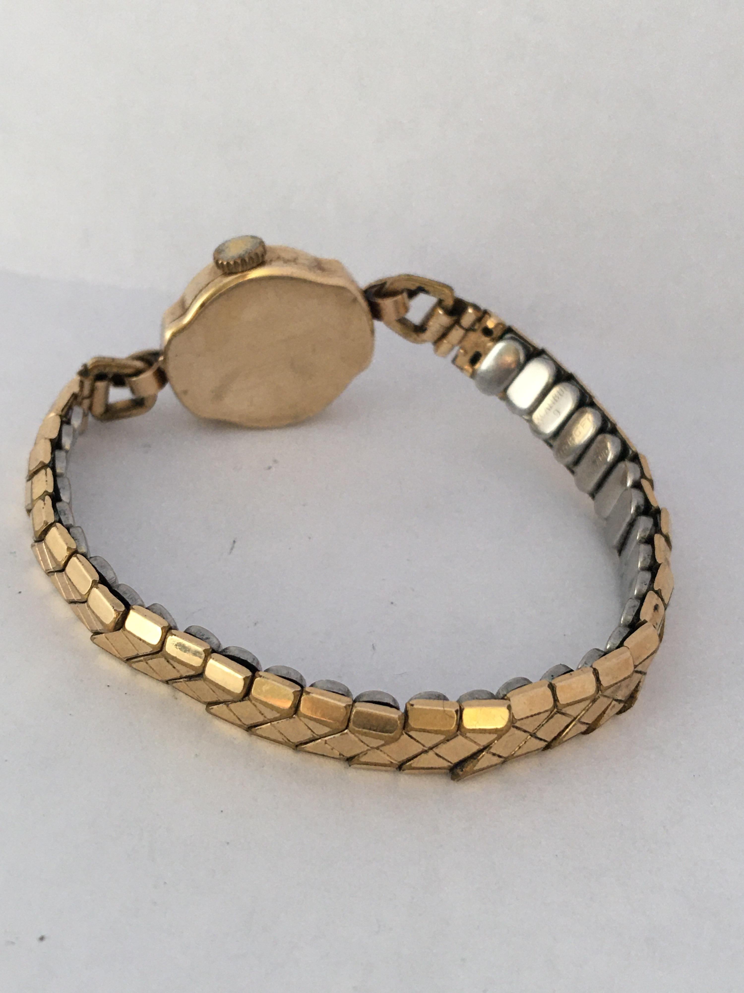 Women's Vintage 1950s 9 Karat Gold Ingersoll with Rolled Gold Strap For Sale