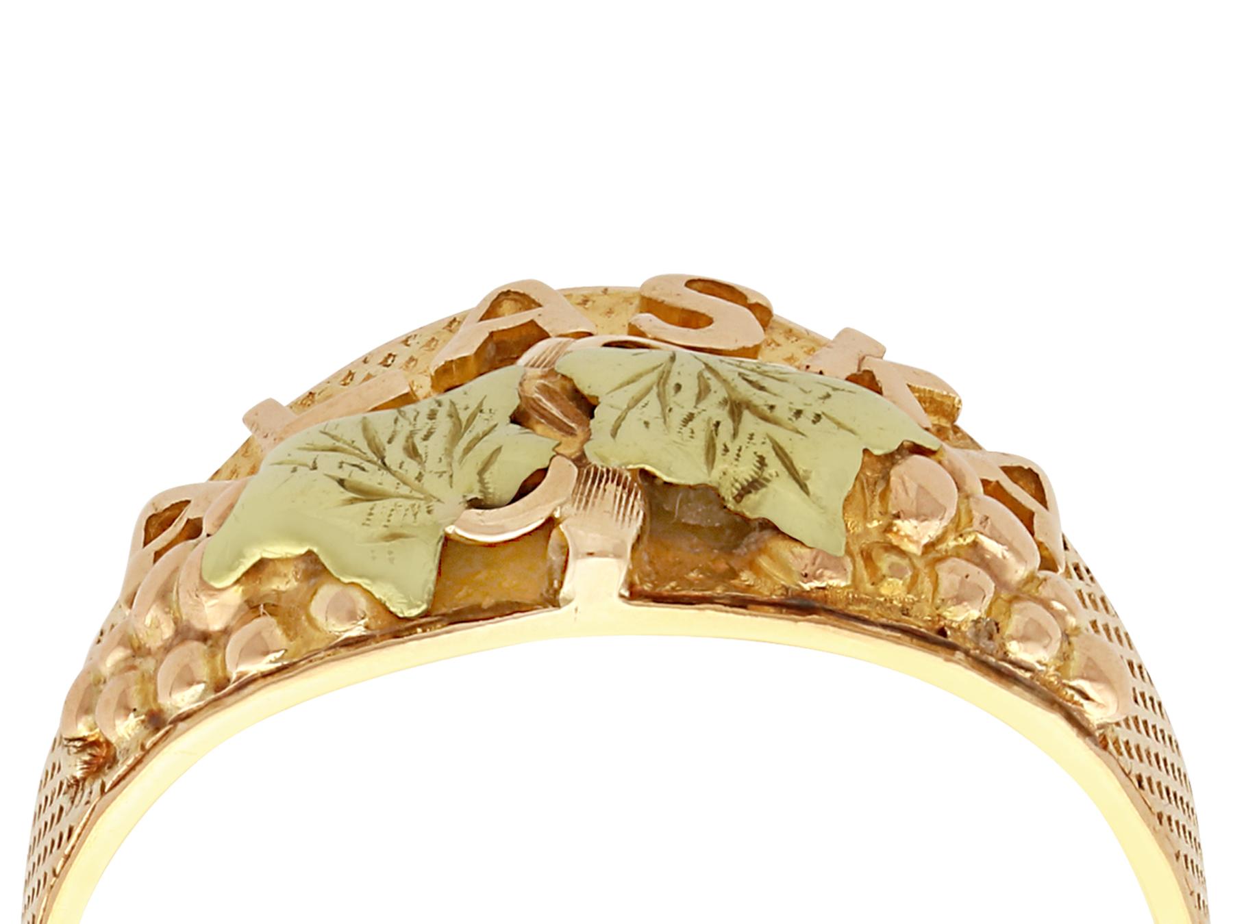 A fine and impressive Black Hills Gold ring in two color 14k gold; part of our jewelry and estate jewelry collections.

This fine and impressive 'Black Hills'* ring has been crafted in two tone 14k yellow gold.

The anterior face of the substantial,