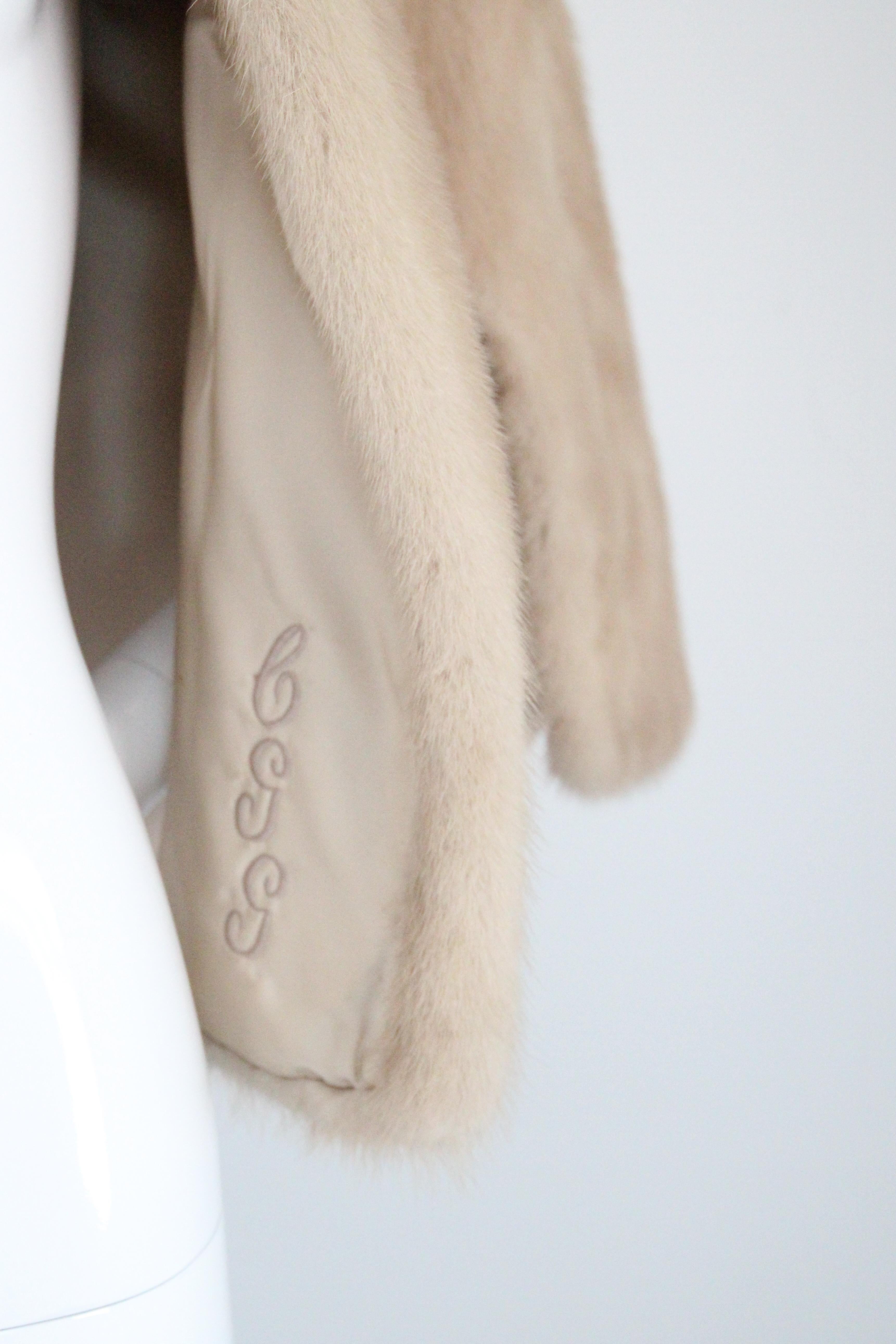Rendered in the softest shade of blonde mink, this late 1950's shoulder cape, which boasts the original owners initials 