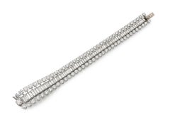 Vintage 1950er Boucheron-Armband mit 57,00 Karat runden und Baguette-Diamanten