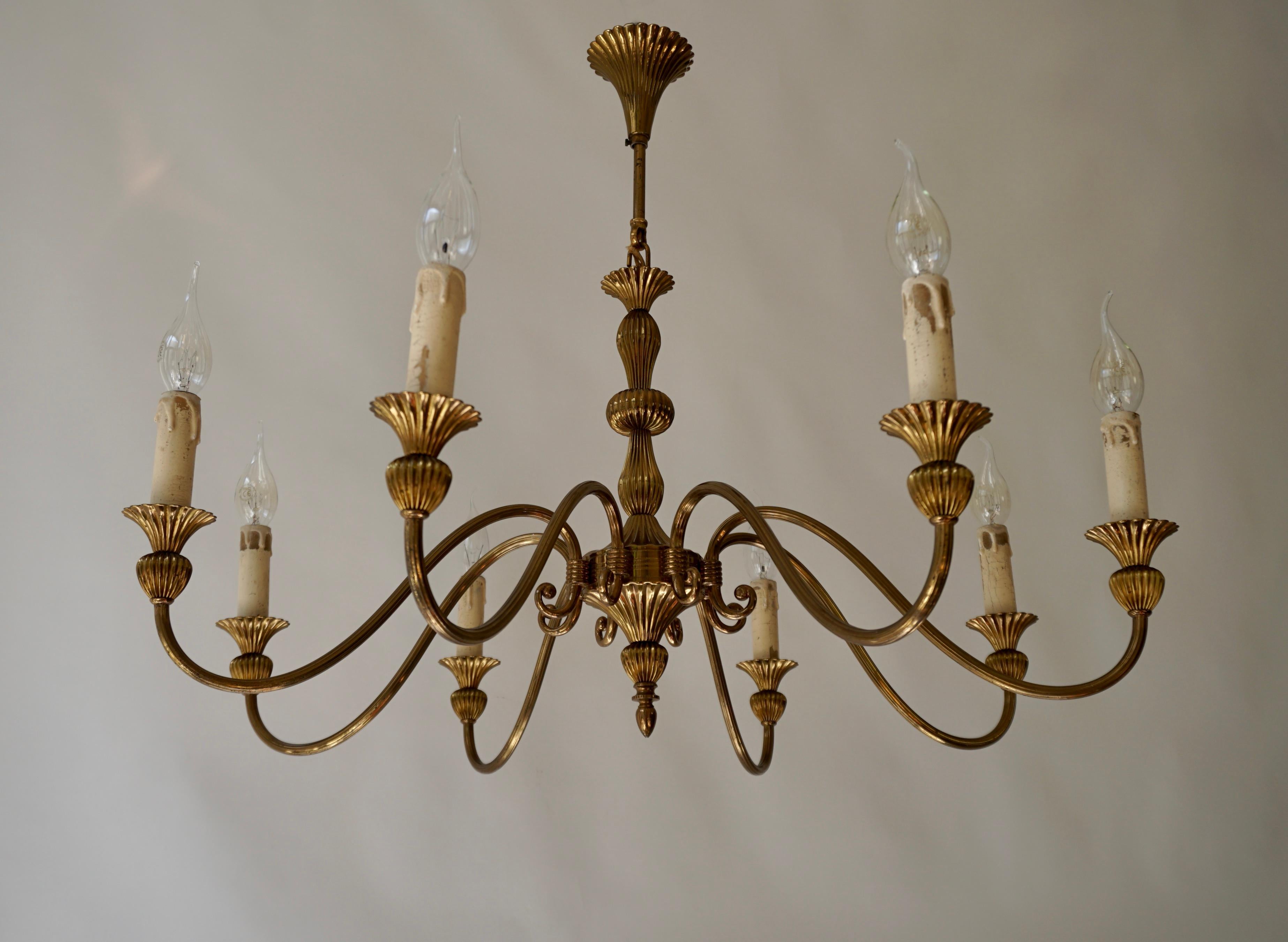 Italian eight-arm chandelier in brass.

Diameter 28.7