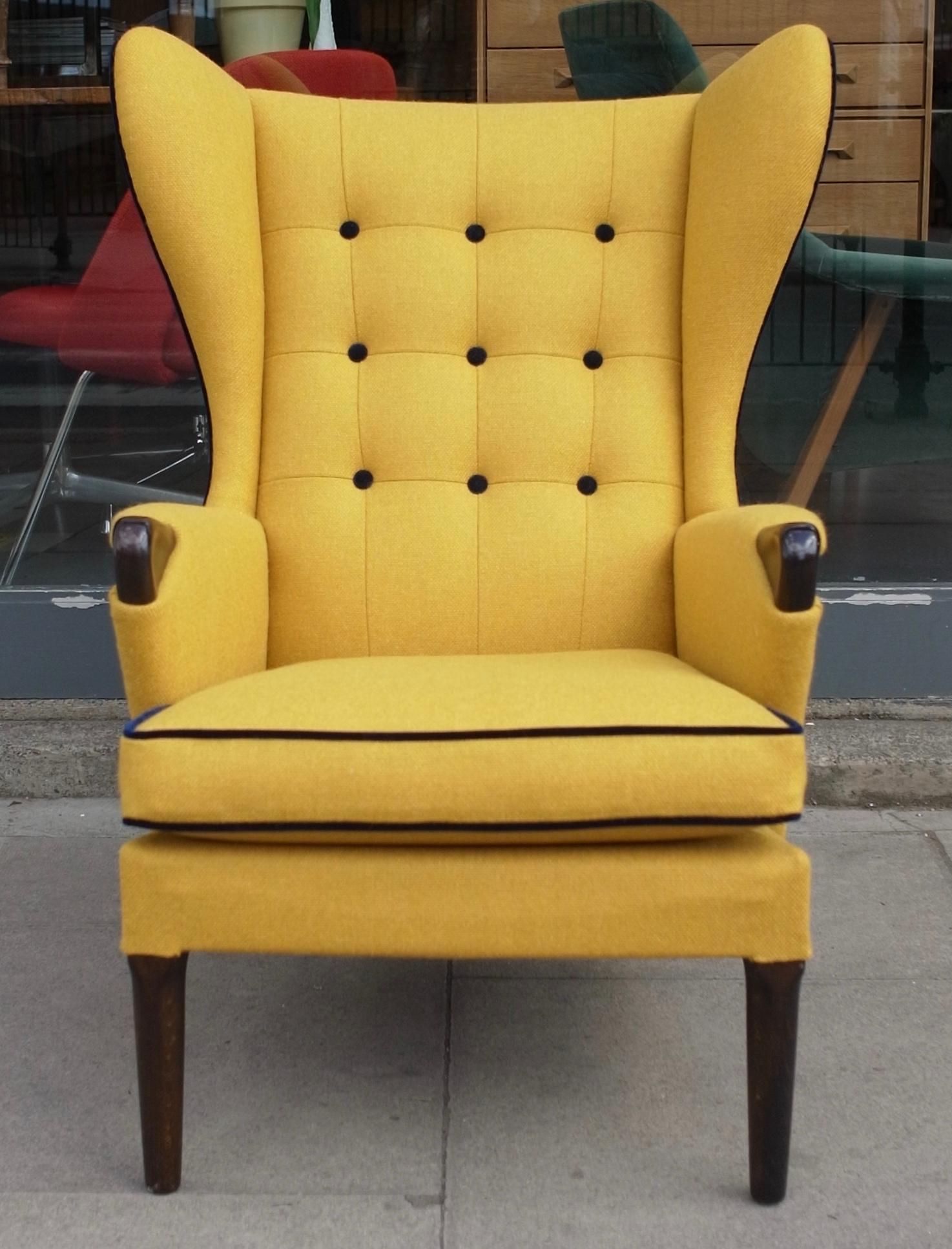 Mid-Century Modern Vintage 1950s British wingback armchair upholstered in quality  yellow textile For Sale