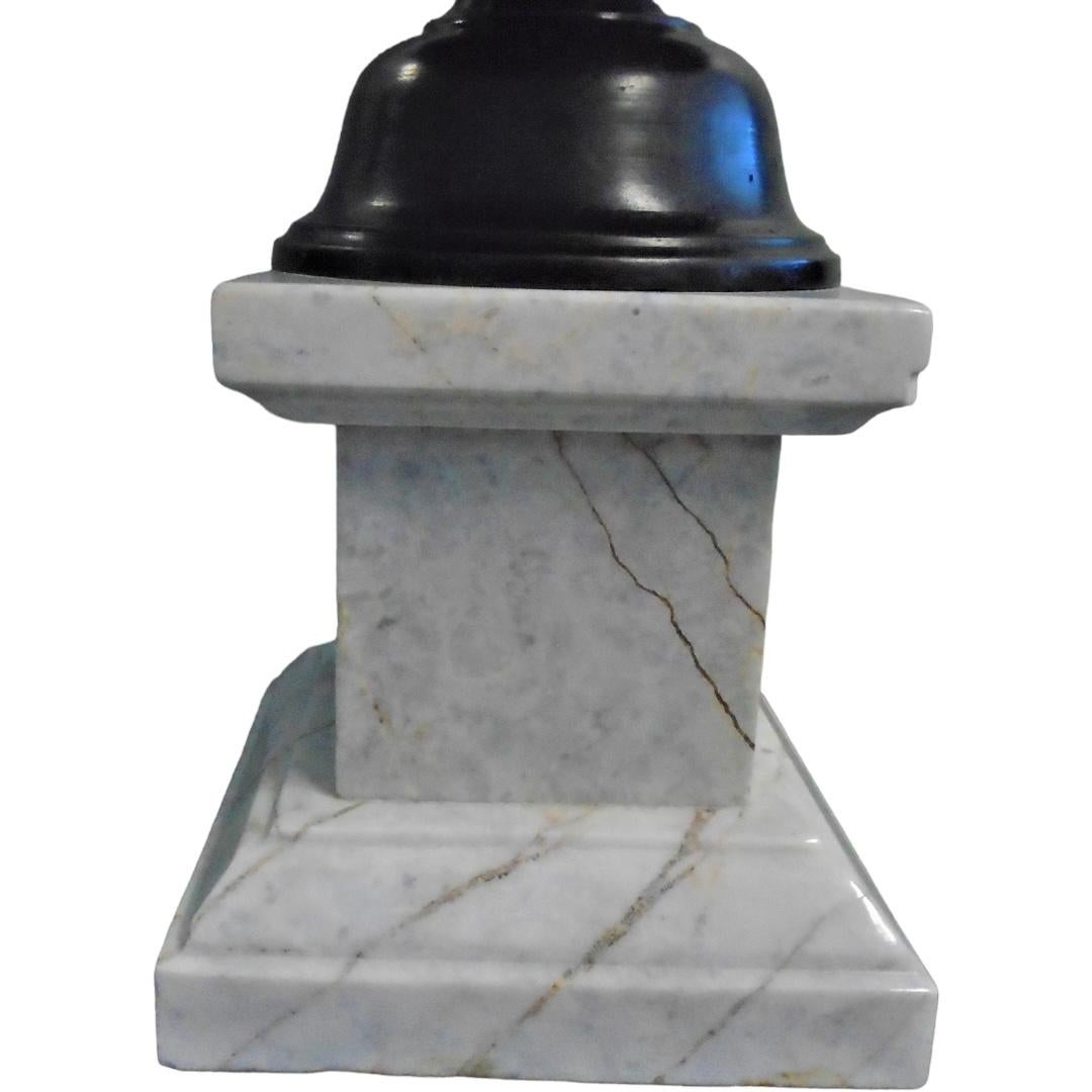 Add a touch of vintage elegance to your home decor with this stunning ornamental pedestal centerpiece.  Crafted in the 1950’s, this piece features a beautiful marble base and a bronze top that exudes timeless charm.  Perfect as a decorative accent