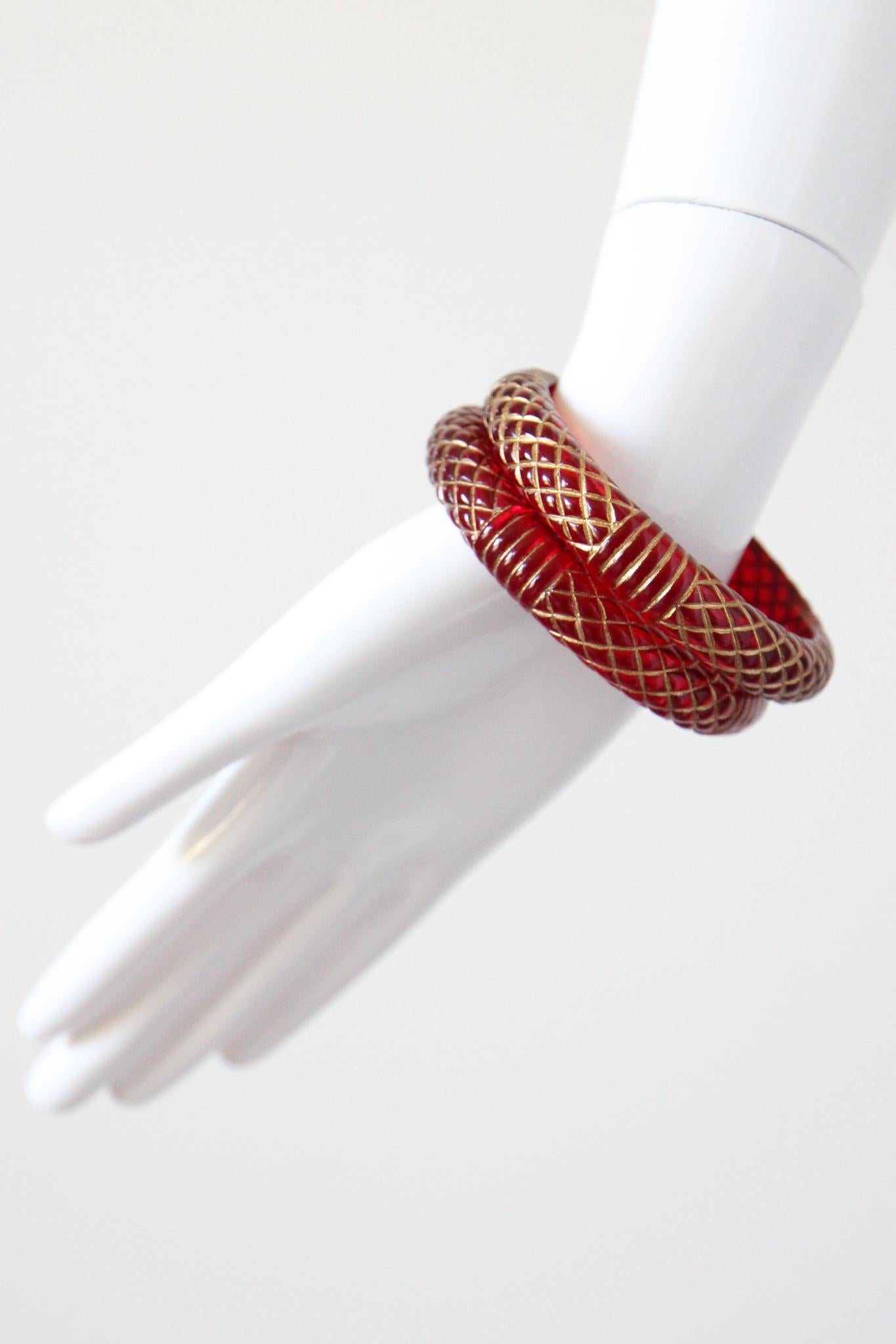 Vintage 1950's Cherry Lucite Bangles 1950's Carved Lucite Bangles Gold Painted For Sale 1