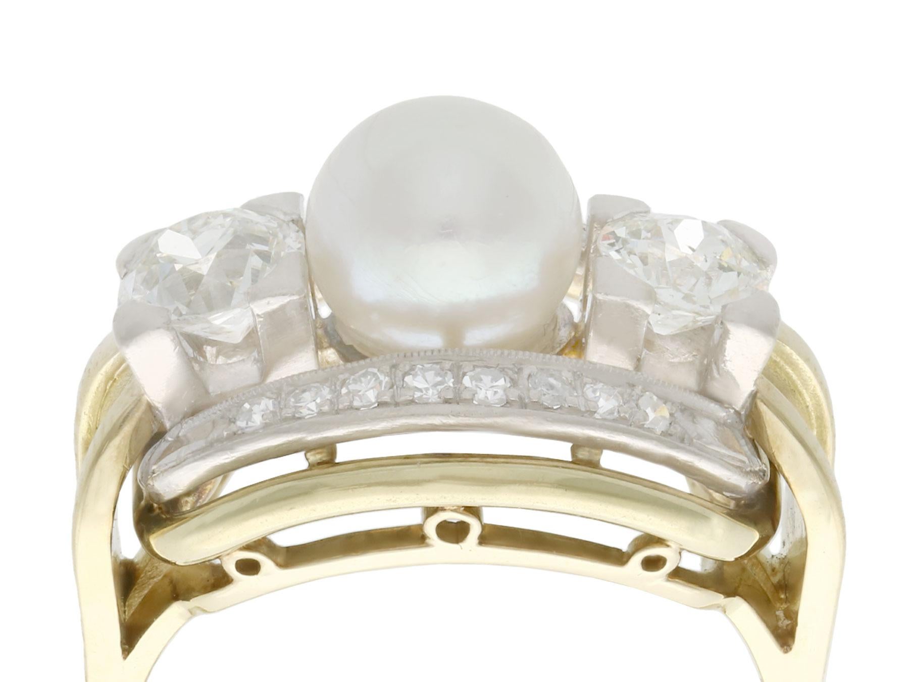 This stunning, fine and impressive pearl and diamond dress ring has been crafted in 14k yellow gold with a 14k white gold setting.

The oval shaped pierced decorated frame is ornamented with an impressive 7mm cultured pearl flanked on either side by