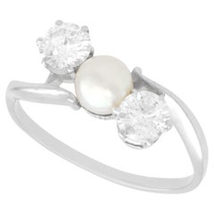 Antique 1950s Diamond and Pearl Platinum Engagement Ring
