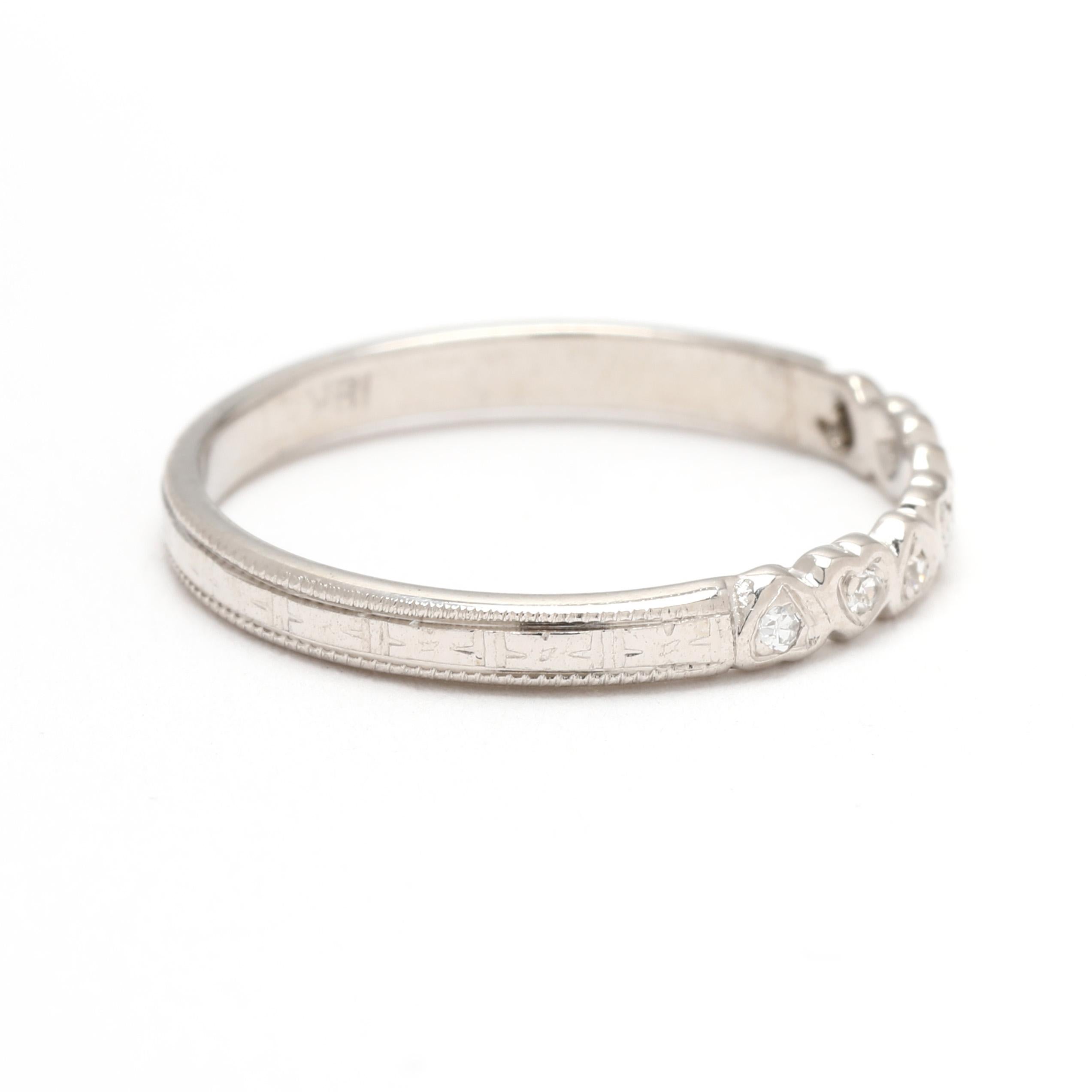 Stones:
diamonds, 7 stones
single cut round
1 mm
approximately .04 total carats
H-I color, VS2-SI1 clarity

Ring Size 6

Width: 2.5 mm

Weight: 1 dwts. / 1.6 grams

A Couple Of Things to Note:
* This is a vintage item and may show signs of wear. It