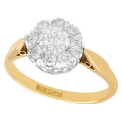 Anillo en racimo vintage de los años 50 engastado con diamantes en oro amarillo y platino
