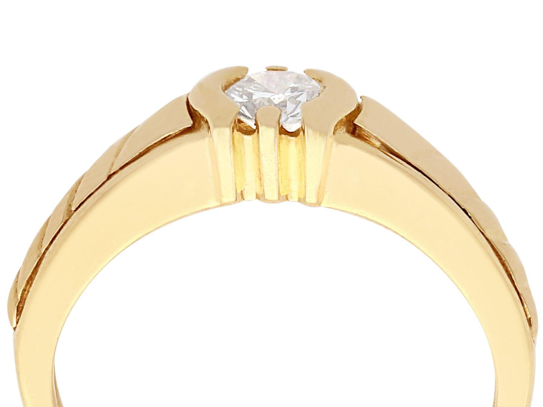  A fine and impressive 0.28 carat diamond and 18 karat yellow gold solitaire ring; part of our diverse vintage jewelry and estate jewelry collections.

This fine and impressive solitaire ring has been crafted in 18k yellow gold.

The substantial
