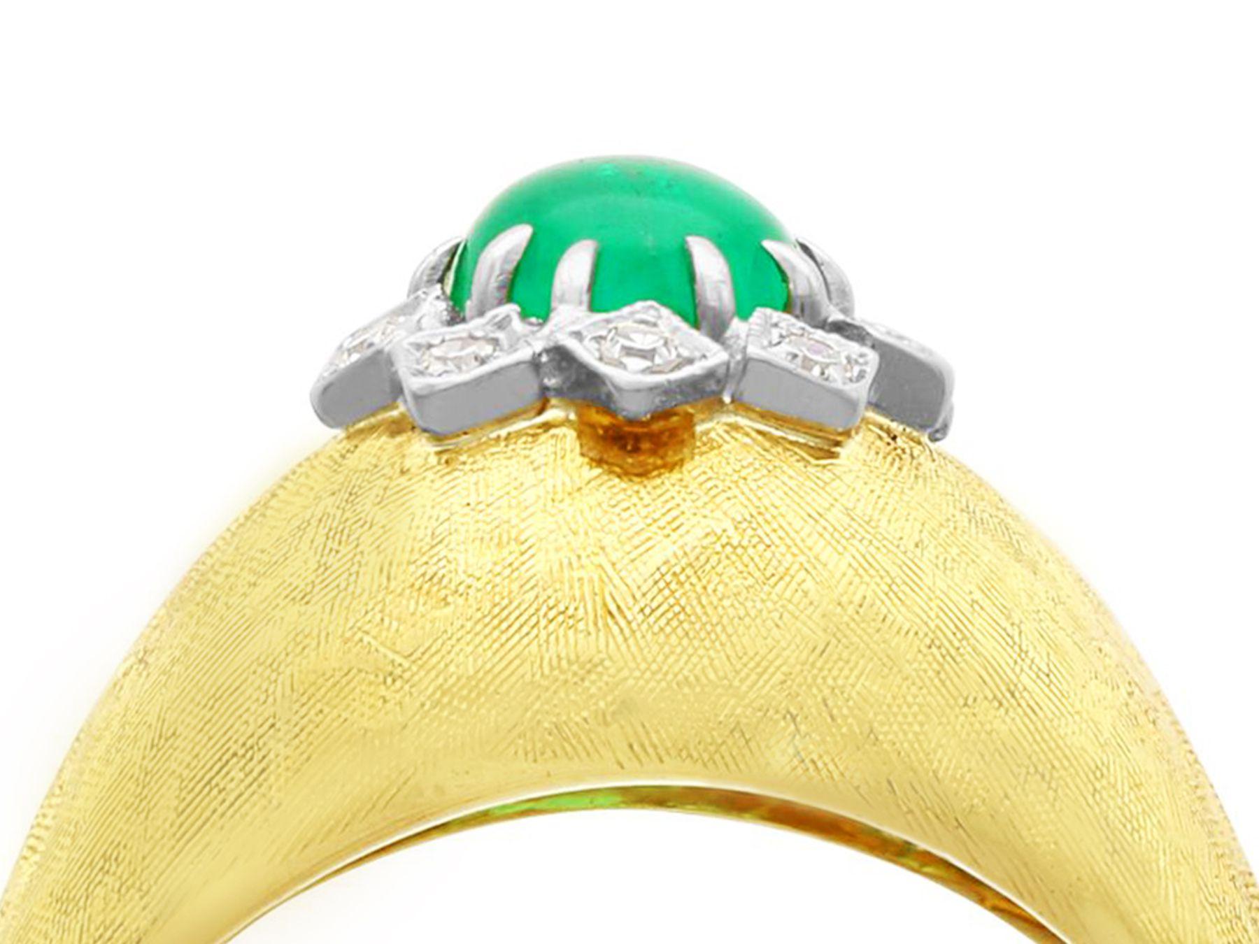 A fine vintage 0.60 carat emerald and 0.15 carat diamond, 18k yellow gold and 18k white gold set dress ring; part of our diverse vintage jewelry collections.

This fine and impressive vintage emerald dress ring has been crafted in 18k  yellow gold