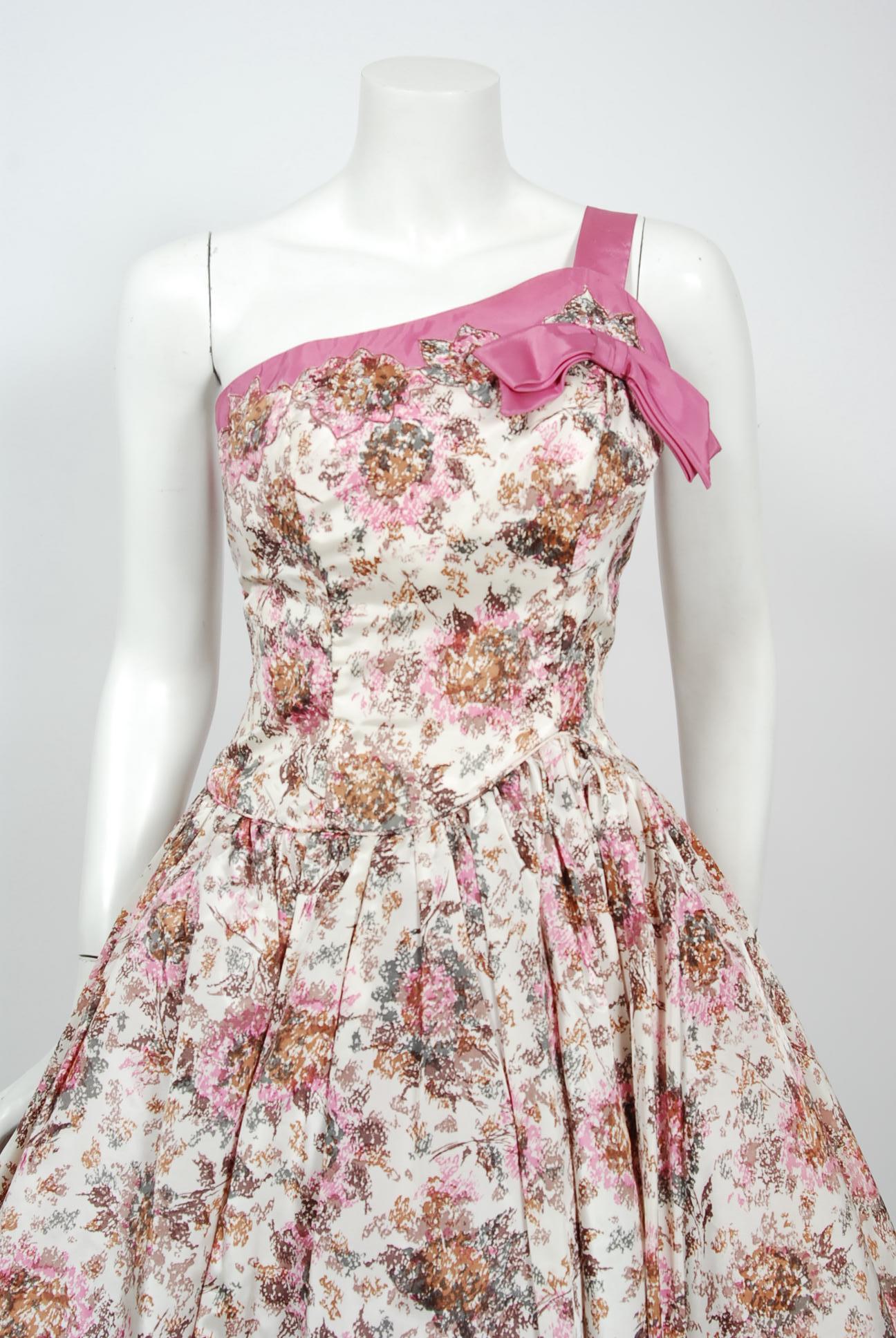 With its vivid pink floral-garden watercolor print and flawless 