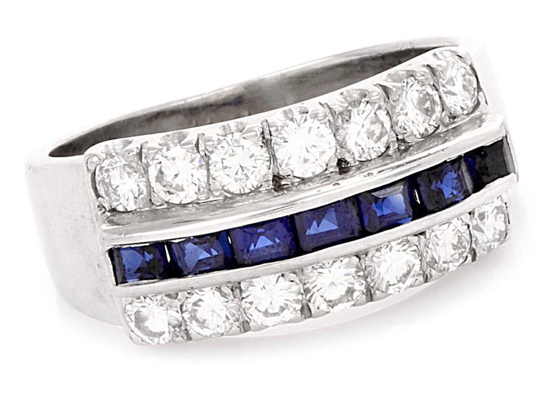 This beautiful vintage 1950s estate diamond sapphire band ring is comprised of solid 18k white gold ring is set with 14 beautiful brilliant diamonds, totaling approximately 0.70 carats 
The diamonds are G-H-I in color and VS1-VS2 in clarity. Very
