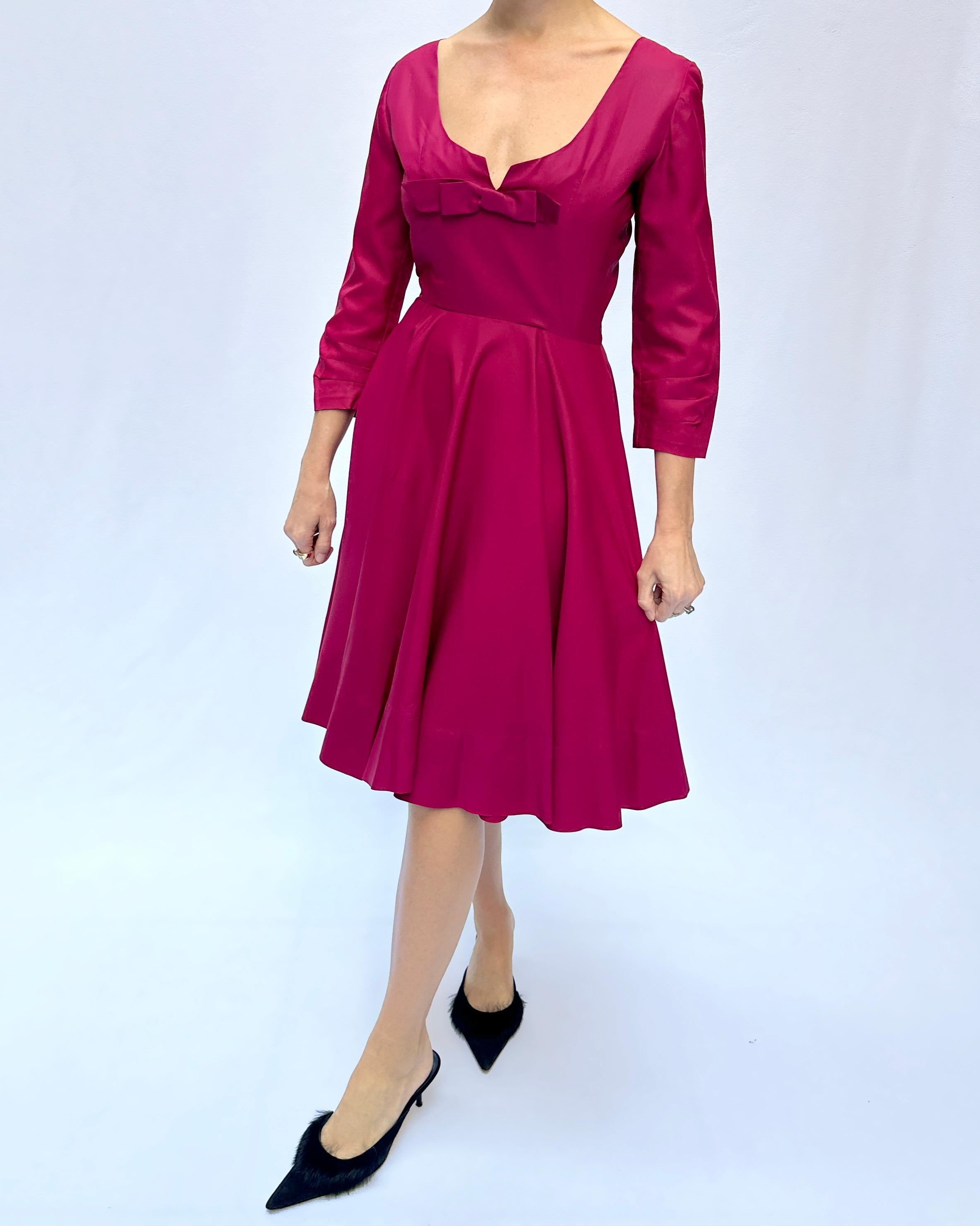 This vintage fit-and-flare dress was custom made in the late 1940s/early 1950s and features the most flattering fit, a nod to Christian Dior's 