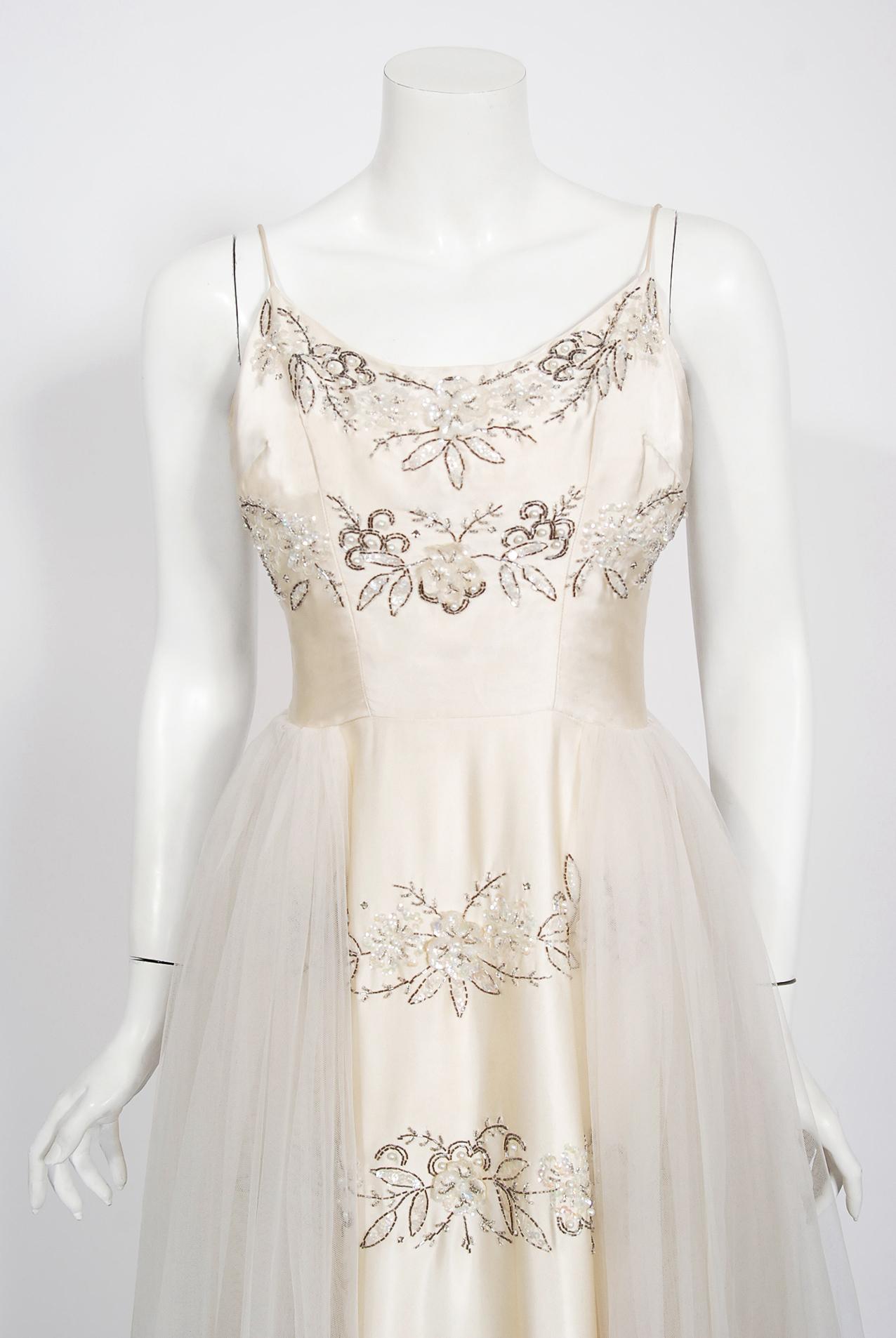 Breathtaking mid-1950's ivory white bridal dress by the highly adored label 