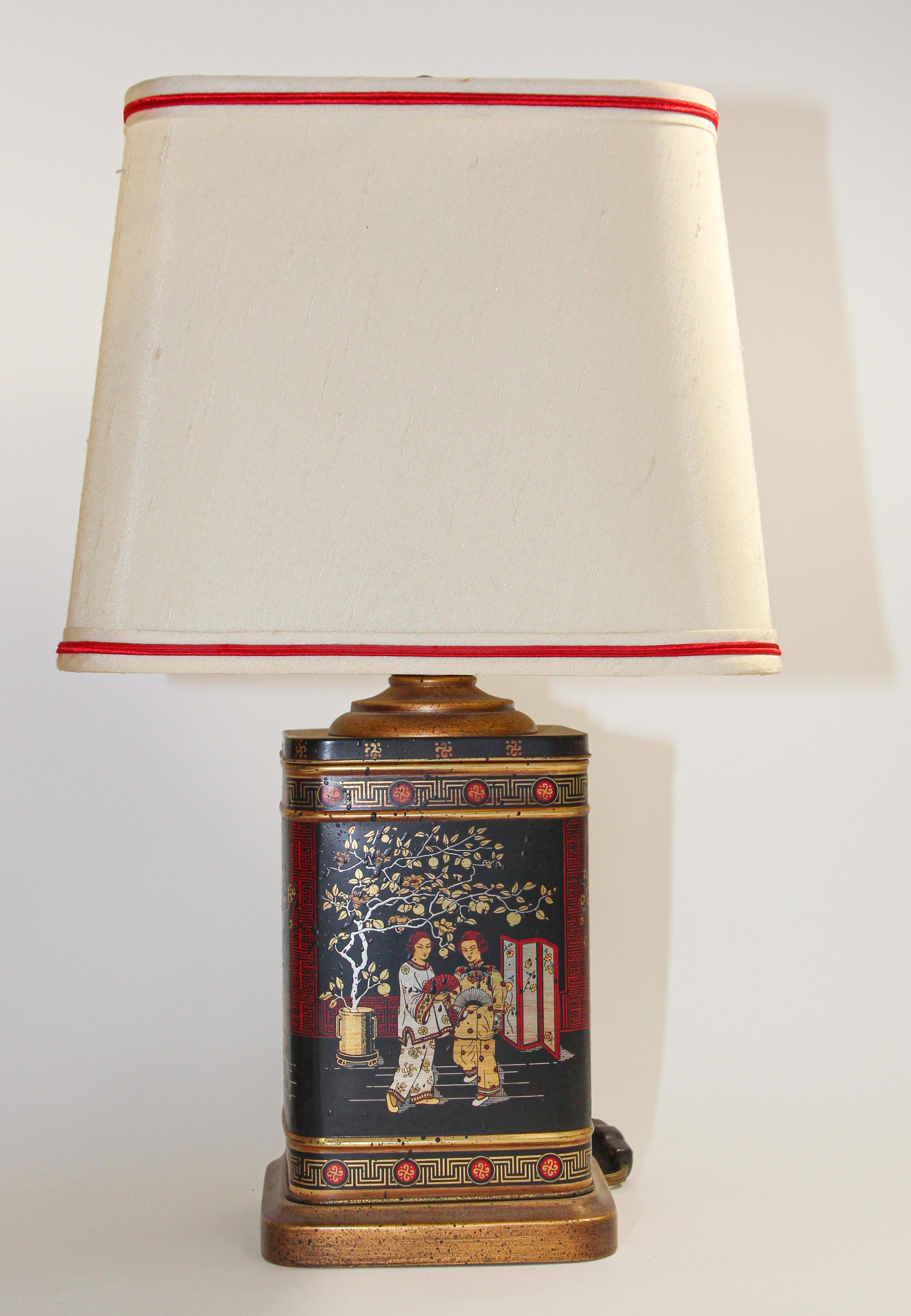 Set of two vintage 1950’s Frederick Cooper Chinoiserie table lamps.
Vintage Frederick Cooper Asian tea tin canister turned into table Lamps,
Vintage table lamps, one large, one smaller made by Frederick Cooper Chicago.
Set on gold finish wooden base