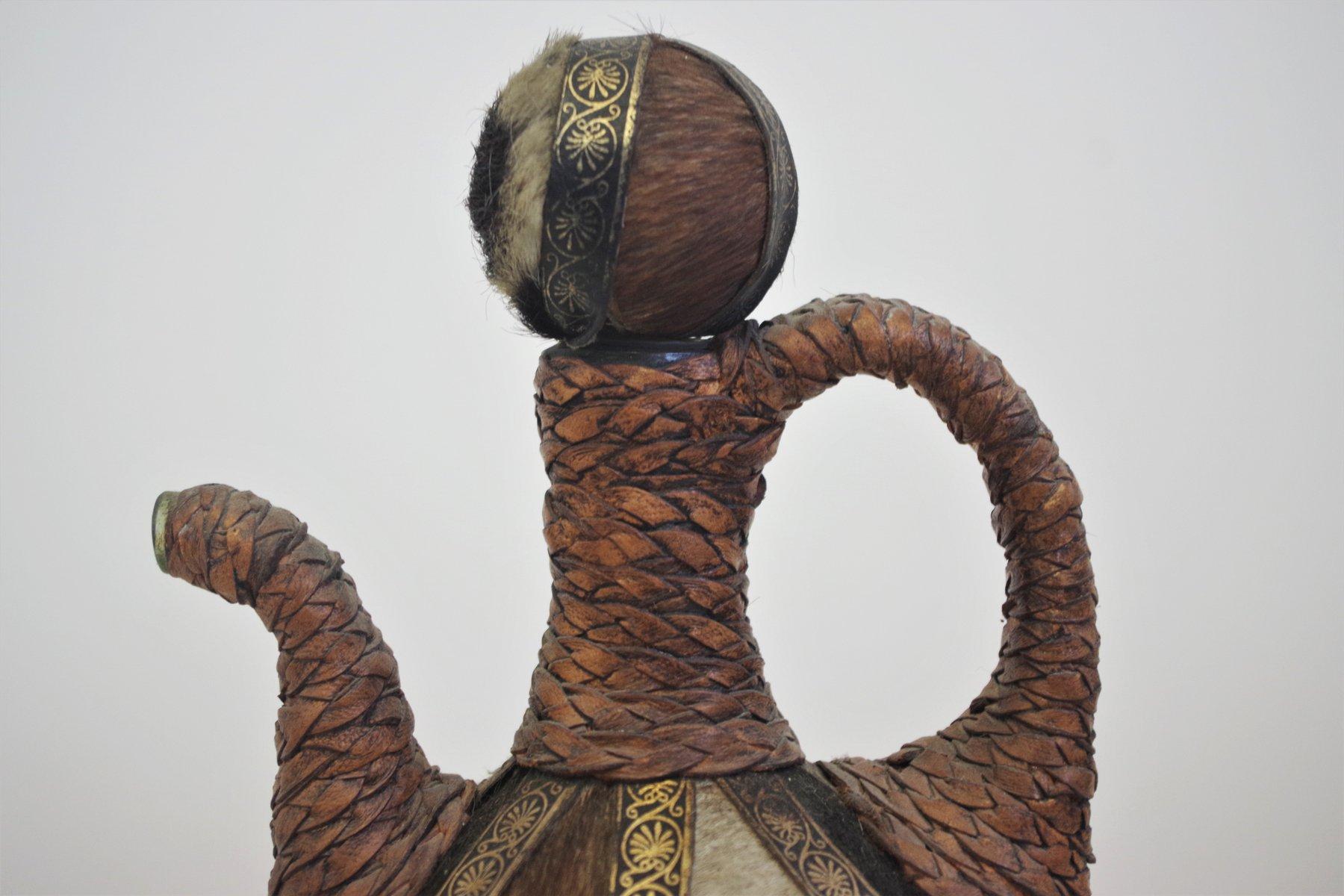 Vintage 1950s Glass Bottle - Handcrafted with Fur, Rope, and Metal Accents For Sale 2