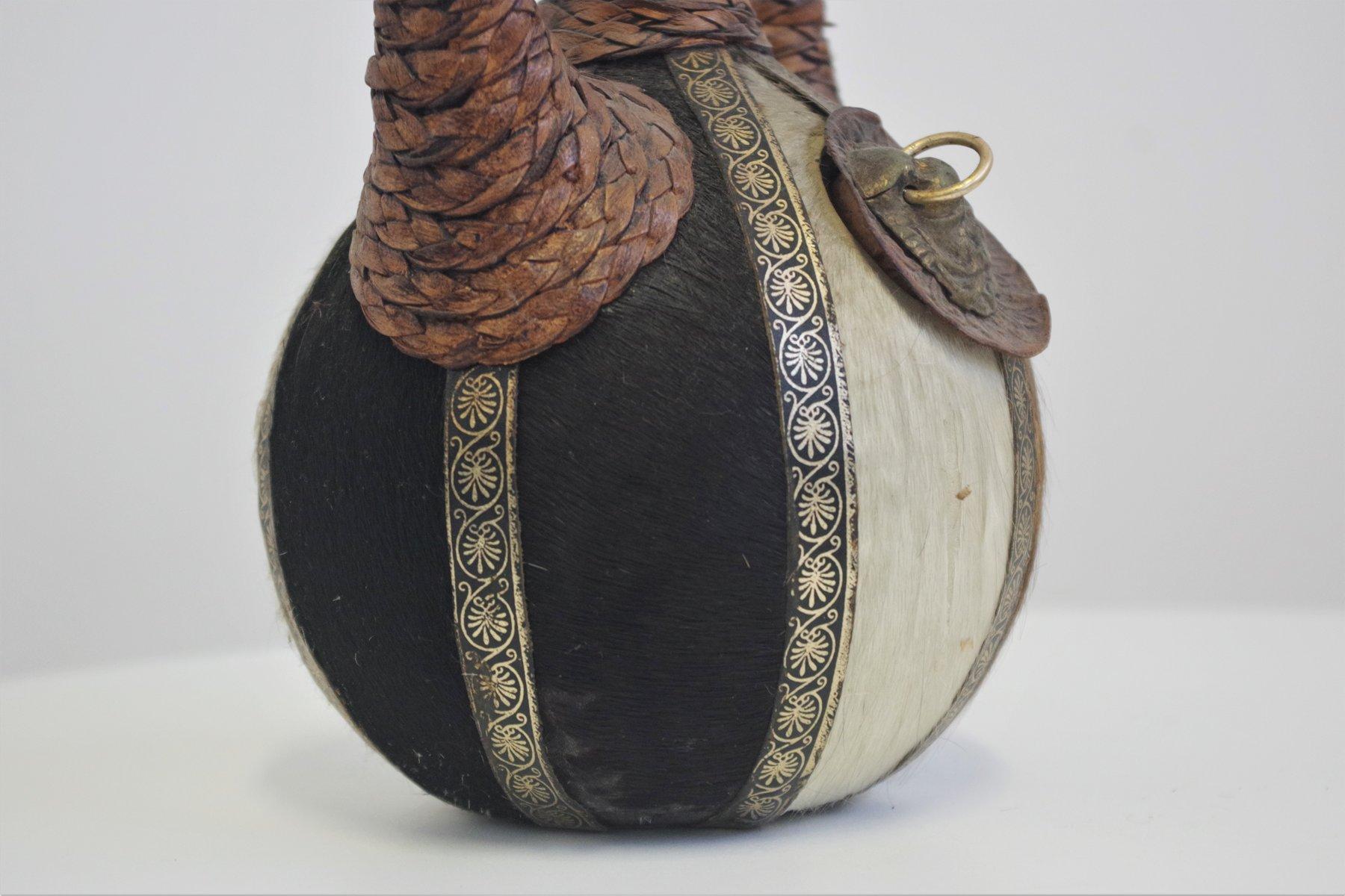 Vintage 1950s Glass Bottle - Handcrafted with Fur, Rope, and Metal Accents For Sale 4