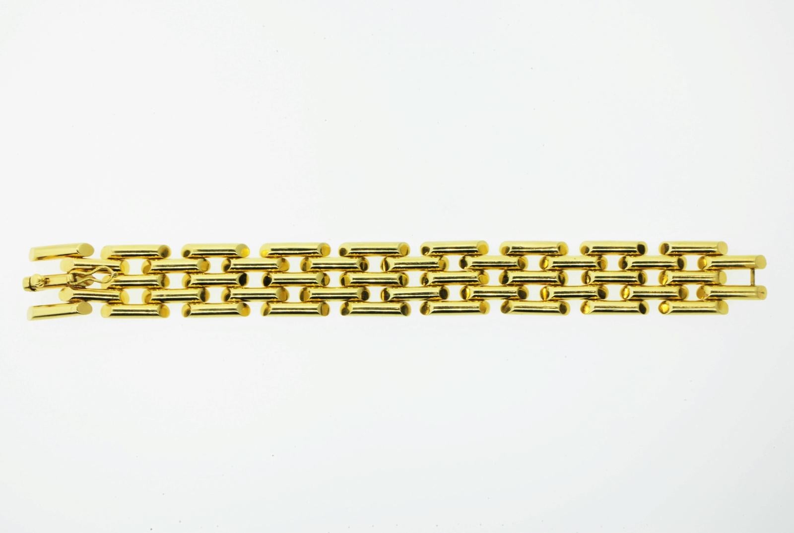 This fun architectural bracelet is crafted in the form of tubular articulated links, handcrafted to precise perfection.  The bracelet has an ingenious spring clasp and  measures 7 1/4 inches  long.  A day/night wearable bracelet!