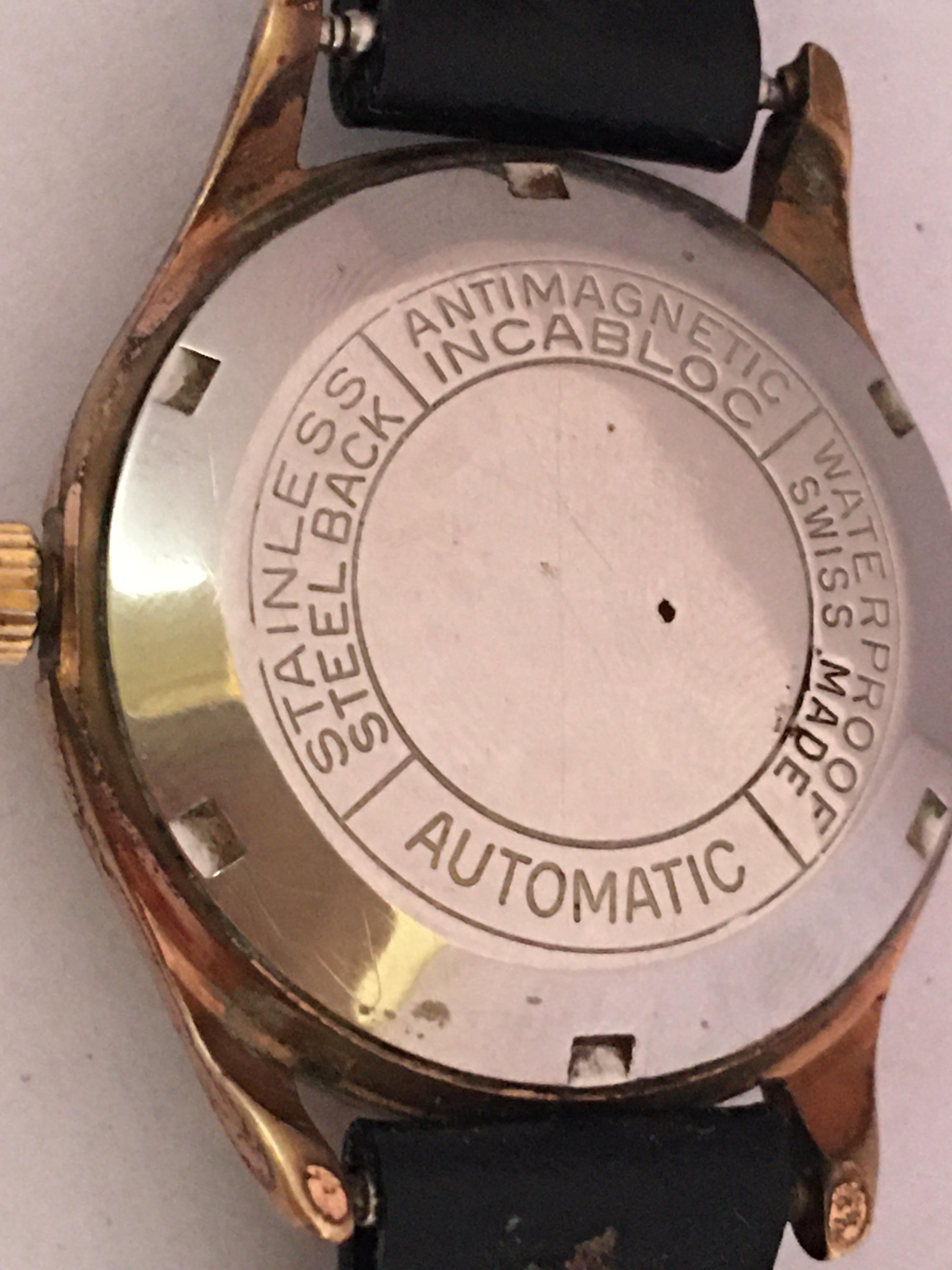 Women's or Men's Vintage 1950s Gold-Plated and Stainless Steel Back Swiss Automatic Watch For Sale