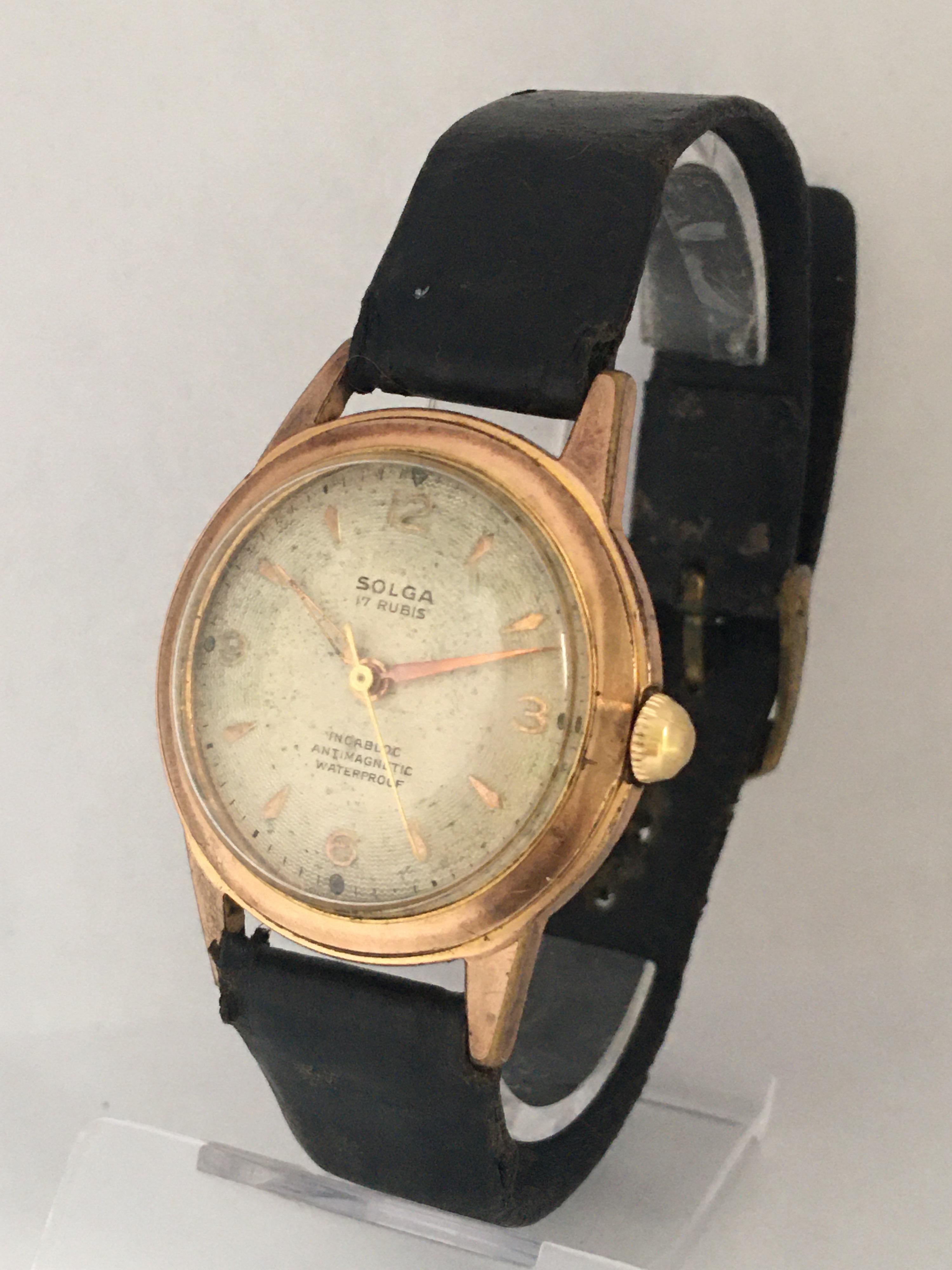 This beautiful pre-owed vintage hand winding watch is in good working condition. It is recently been serviced and it runs well. Visible signs of ageing and wear with light scratches on the back case. The watch dial is a bit worn as shown. The strap
