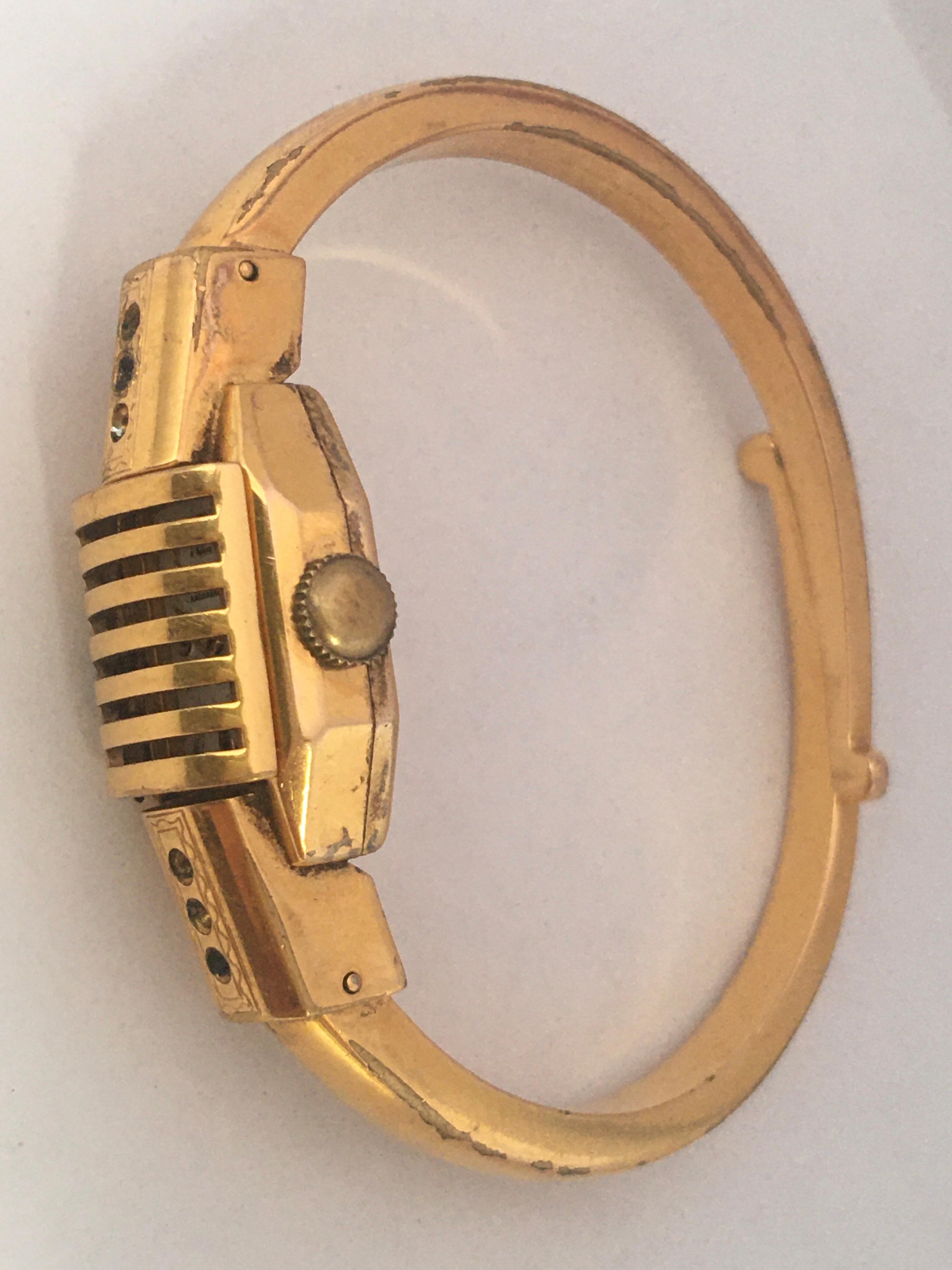 This beautiful pre-owned vintage hand winding watch is in good condition and it is ticking well. Visible signs of ageing and wear with some tarnished on the bangle strap and on the watch case. Some small and light scratches on the watch case as