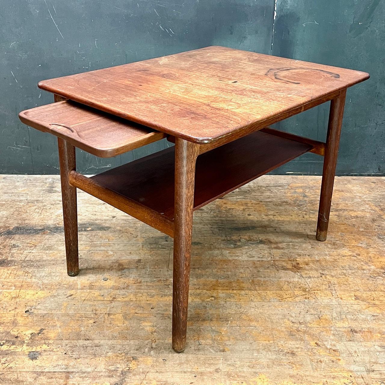 Tight joinery, fully functional. I prefer to keep my vintage and antique pieces in the condition it was at the time of procurement. The removable tray measures 21.25 in x 11.5 in. When extended with the tray on the table rails, the table depth
