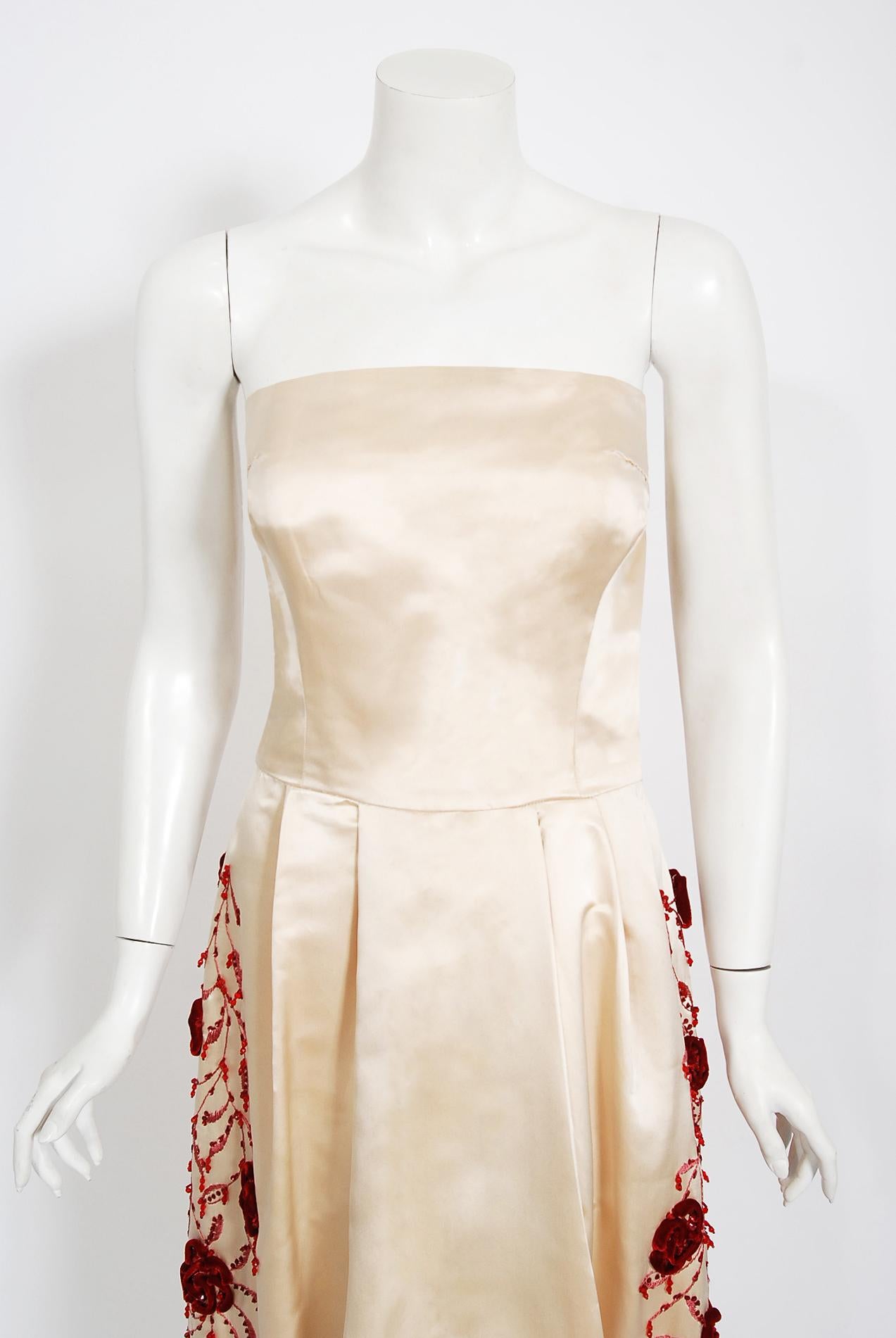 Gorgeous Harvey Berin designer silk-satin formal dress dating back to the early 1950's. Harvey Berin opened his business in 1921, and by the 1940's he was an important name in women's fashion. His designer, Karen Stark, adapted the latest styles