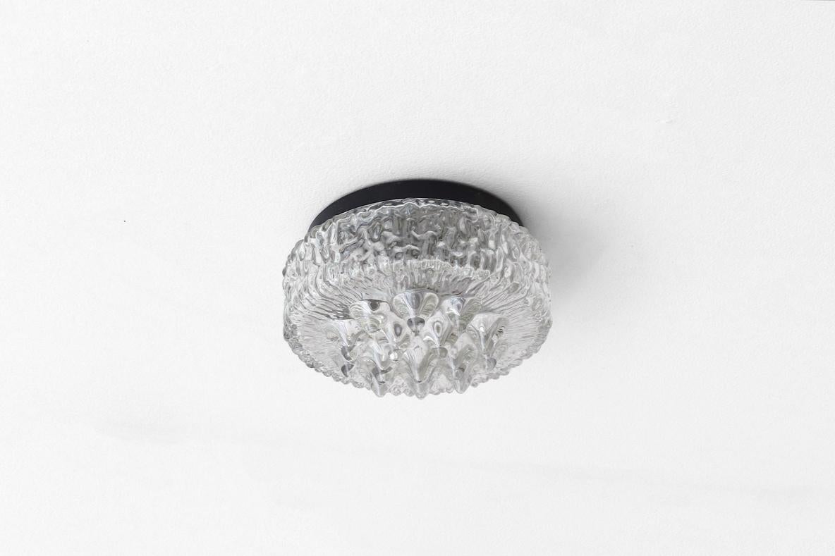 Dutch Early 1950's Heavy Molded Glass Ceiling or Wall Sconce with Ornate Design For Sale