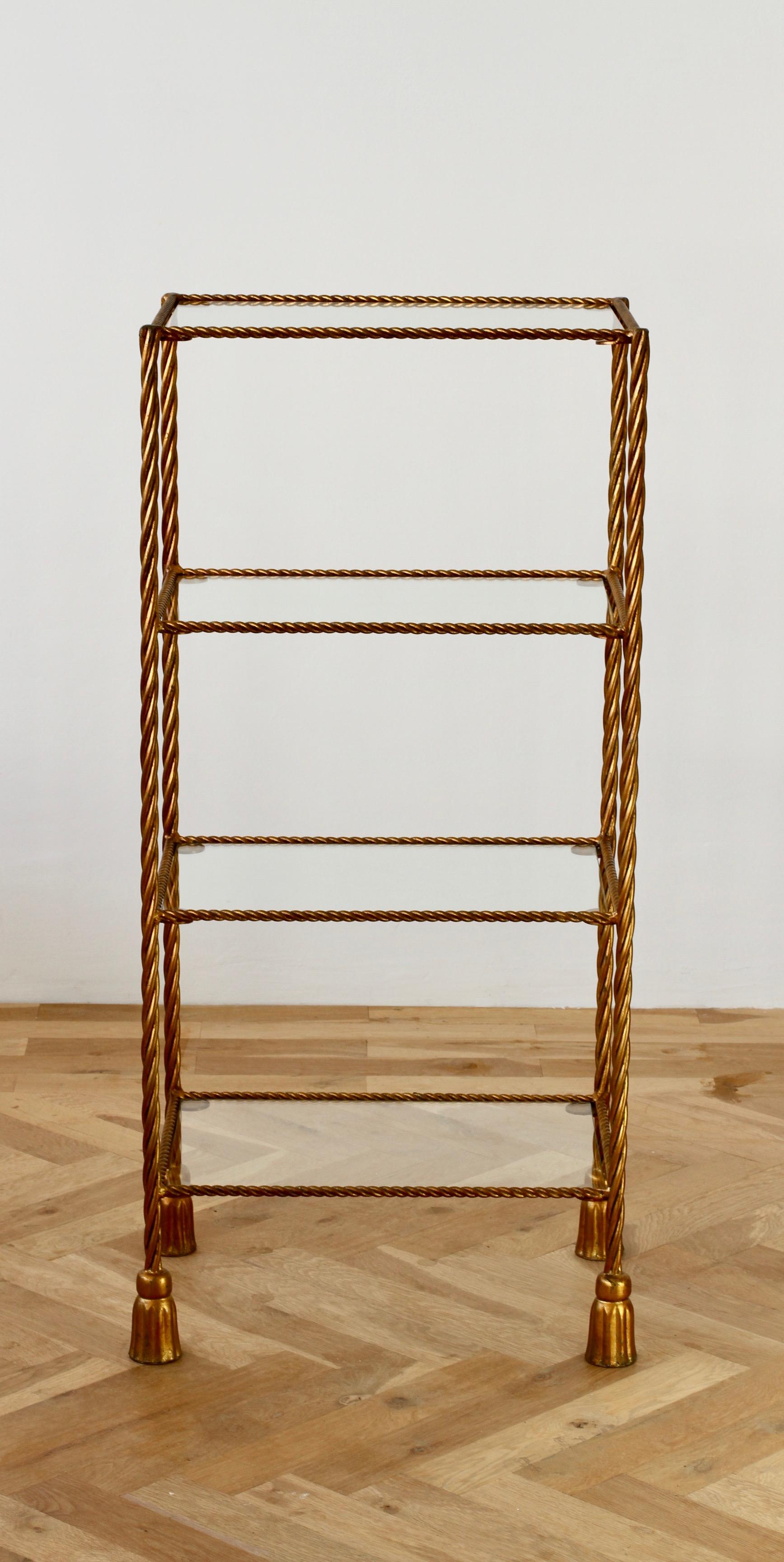 A beautiful handmade Mid-Century 1950s French or Italian made gold gilded wrought iron shelves, bookshelf or stand. Perfect for any lover of the Hollywood Regency style.

Would make an excellent shelve in a bathroom for products and accessories or