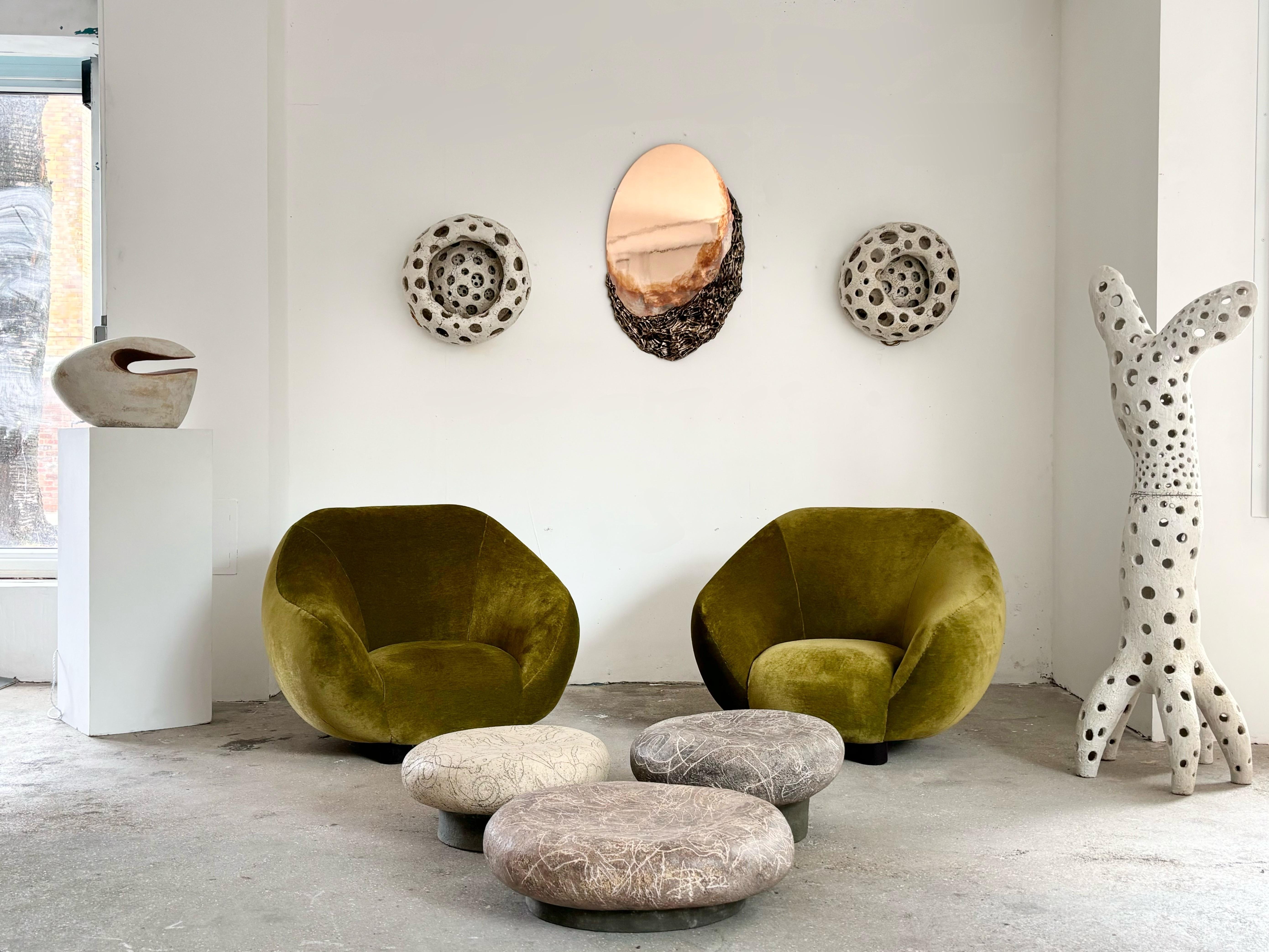 Federico Munari (1907-1998) was an Italian designer known as a master of elegantly organic forms. His seating models - including these chairs - were created to highlight the spirit of rebirth of post-war furniture design characterized by clean lines
