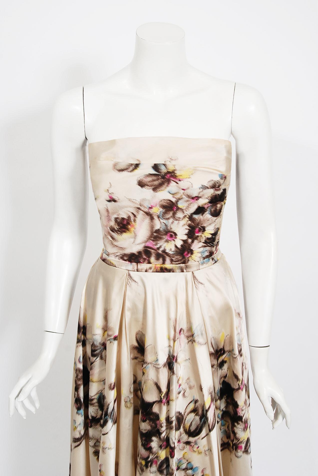 Breathtaking Jeanne Lafaurie Couture watercolor garden two-piece gown ensemble dating back to the mid 1950's era of fashion. Jeanne Lafaurie was a Paris couturier, designing from 1925 until 1958, whose house was known for spectacular fabrics and