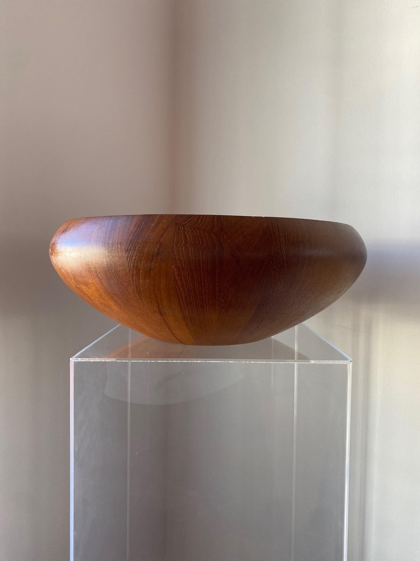 Large bowl designed by Jens Harald Quistgaard. Produced in Denmark by Dansk during the 1950s. Made from solid staved teak. Good vintage condition. Aside from its utilitarian duty, this piece transcends to sculpture.  Large and with its defined