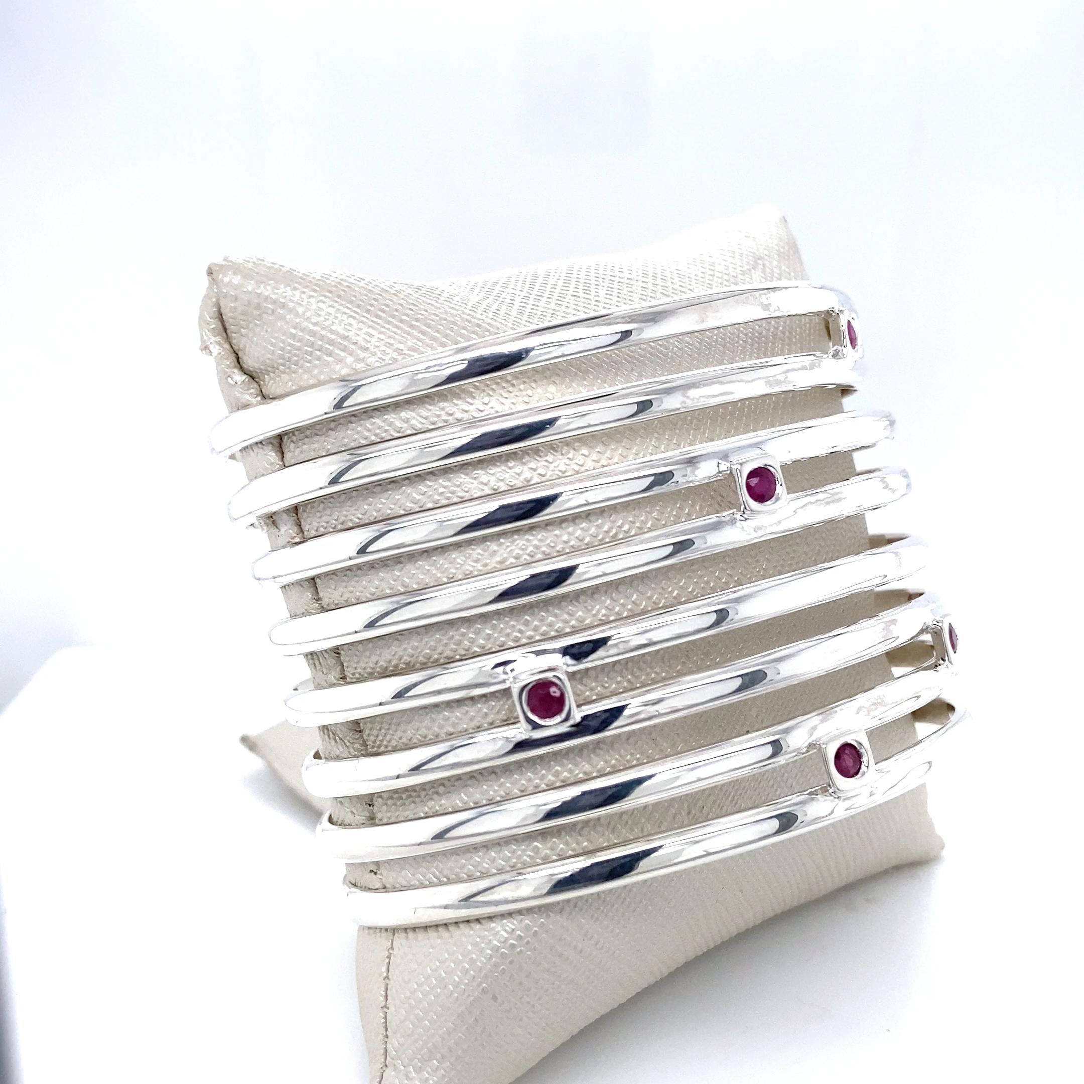 This funky, ginchy model 598 vintage Elle circa 1950s - 1960s bracelet features eight sterling silver strands with spacing between each row creating an approximate 1.75