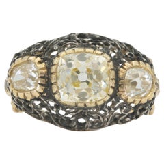 Vintage 1950s Mario Buccellati Old Mine Cut Diamond Three-Stone Bombe Ring