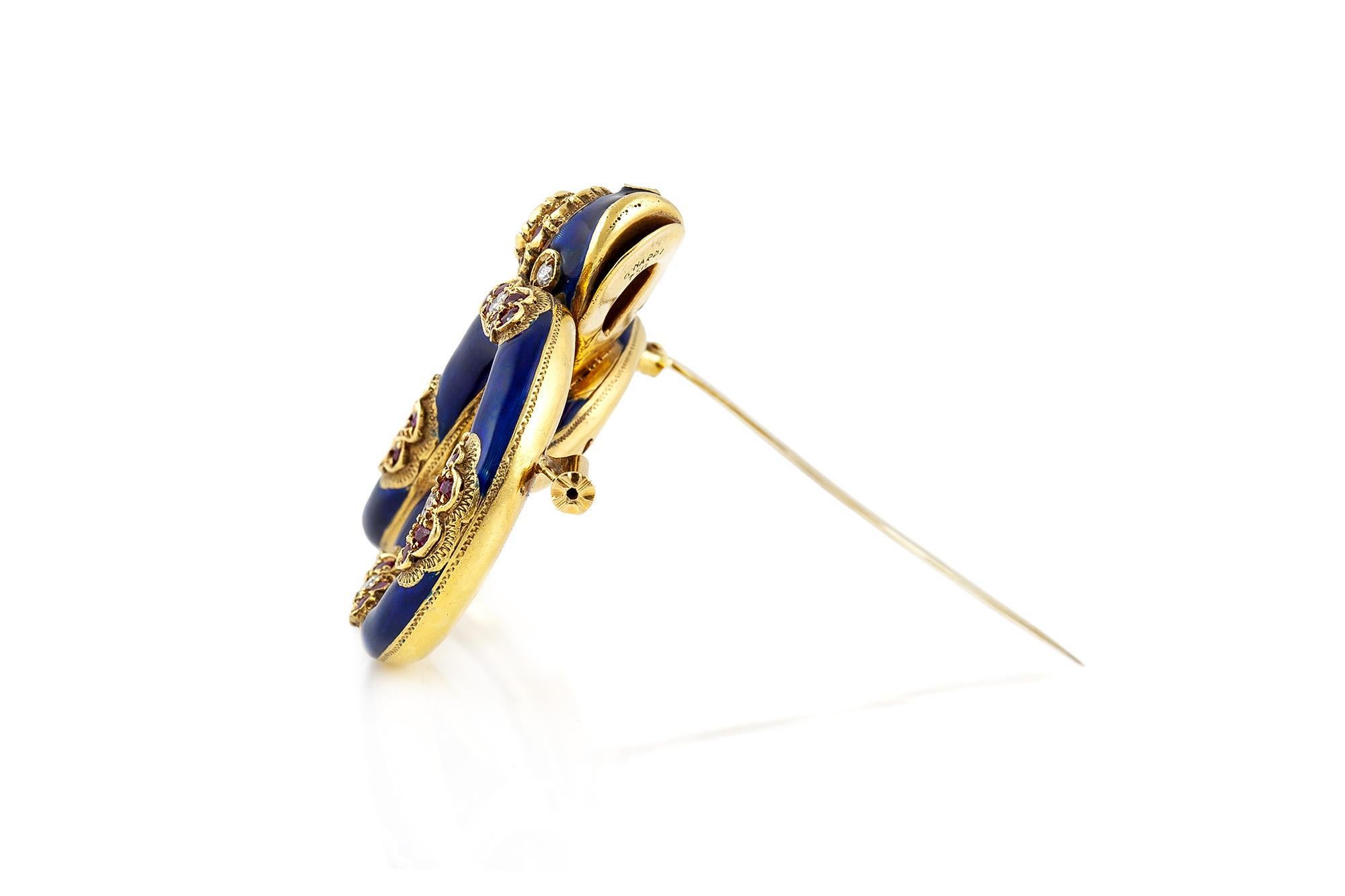 Finely crafted with blue enamel over 18k yellow gold, small round cut Rubies and Diamonds, and a Pear-Shaped diamond on the head weighing approximately 1.50 carats.
Signed by Nardi
Circa 1950s
2 x 2 1/2 inches