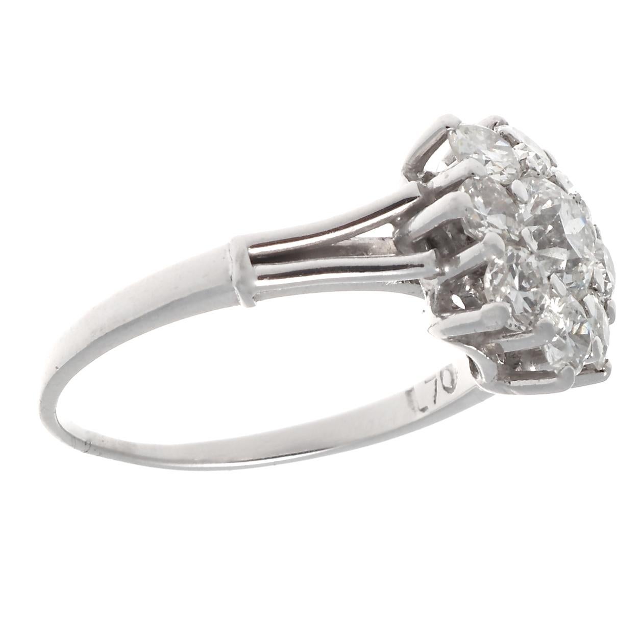 Like a bouquet of diamonds, this vintage cluster ring is a charming way of saying 