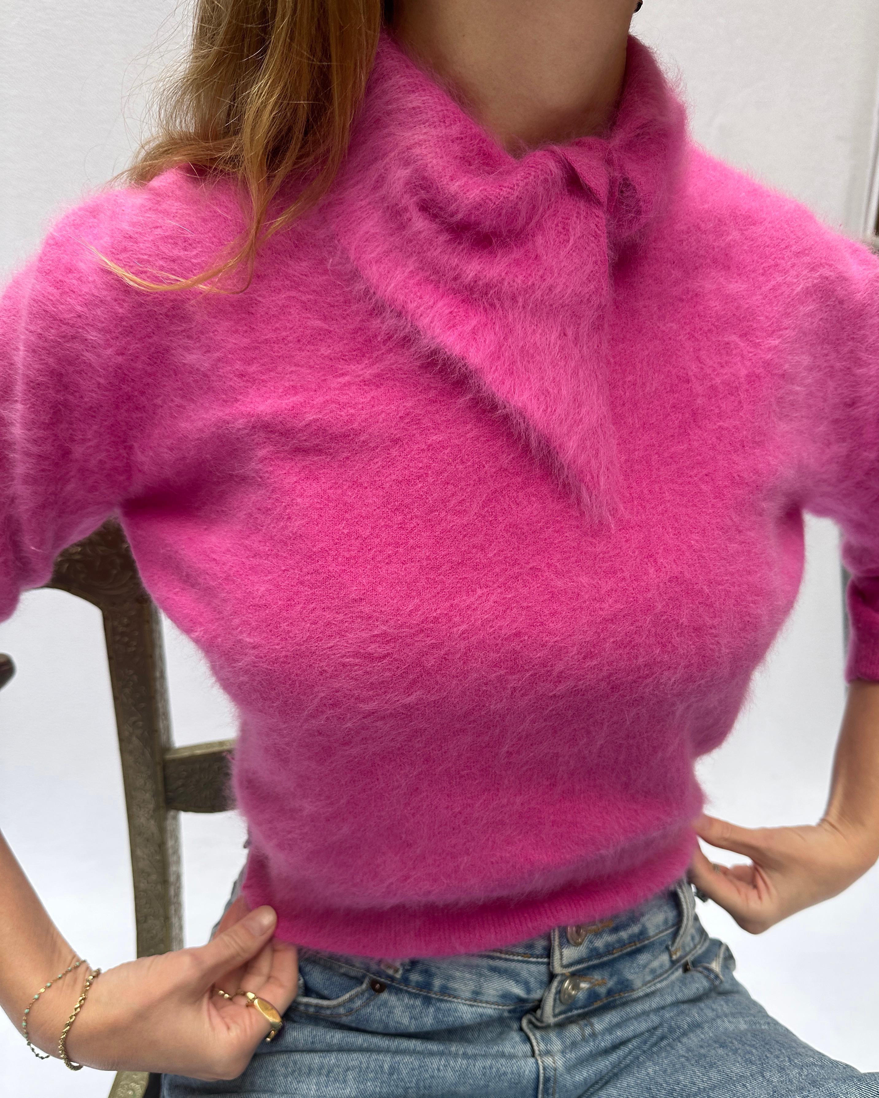 This vintage 1950s Barbie pink cropped angora sweater is pure joy— the color is just perfection. It is made of the softest French angora rabbit hair— it's extremely soft and not the least bit itchy. I absolutely obsessed with the cut and shape of