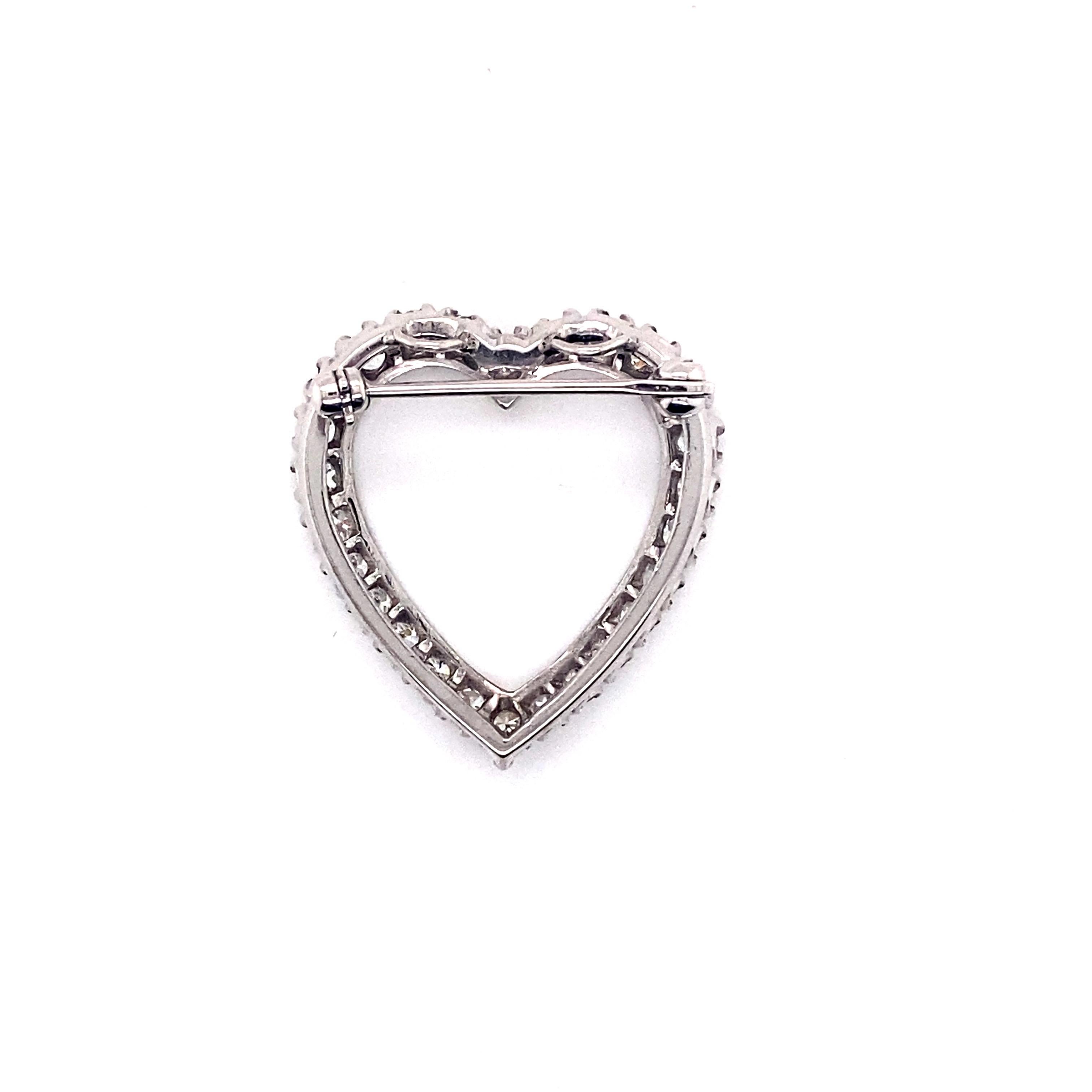 Vintage 1950’s Platinum Diamond Heart Pin and Pendant - There are 26 round full cut diamonds that weigh approximately 1.75ct total weight. The diamonds are set in fishtail prong heads and the quality is H - I color and VS1 - SI2 clarity. The pin