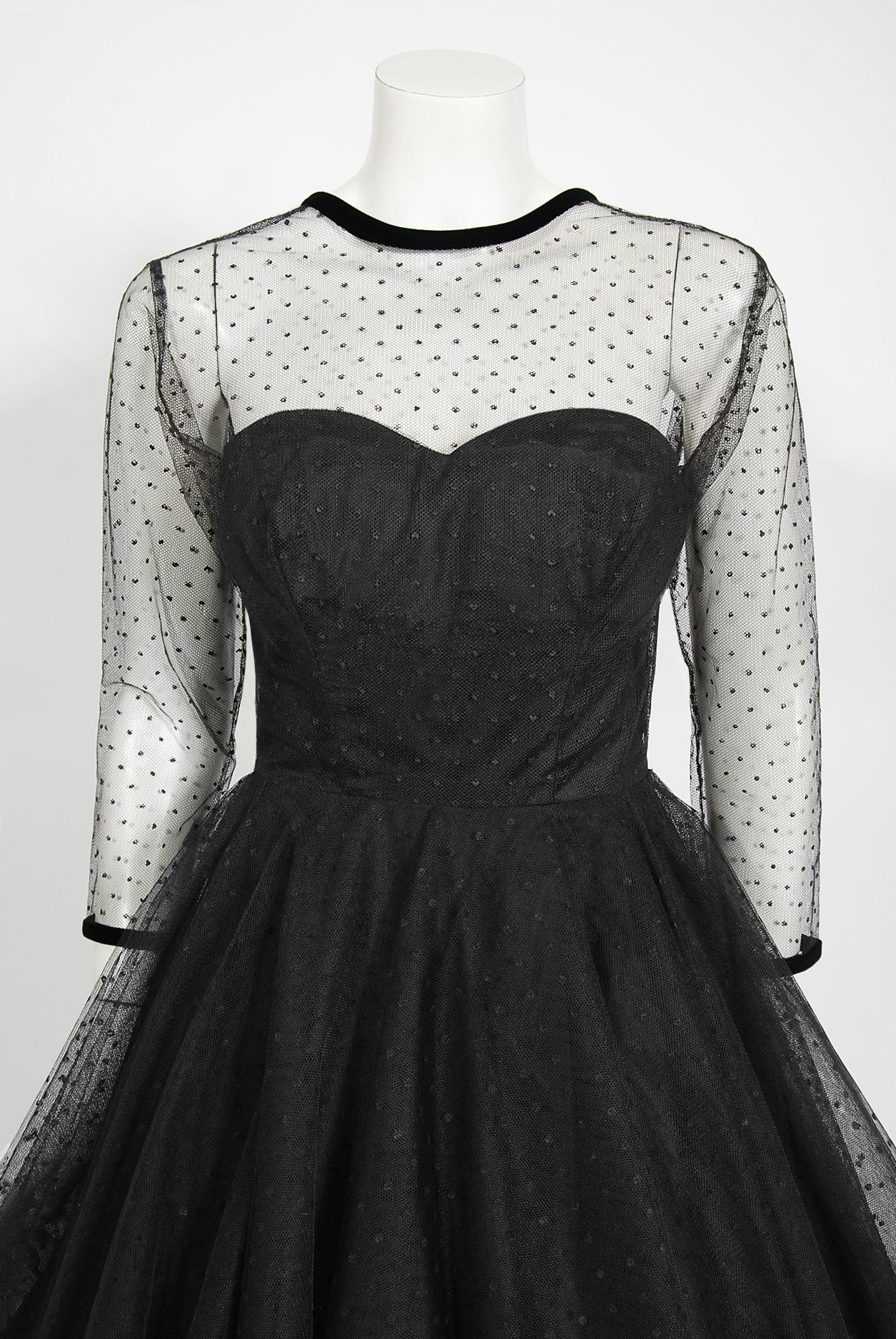 Gorgeous mid 1950's sheer black dotted net tulle party dress by the high-end Rappi label. Rappi was a talented Viennese-born woman named Syd Rappaport who made a name for herself with glamorous formal wear which was much beloved by debutantes with a
