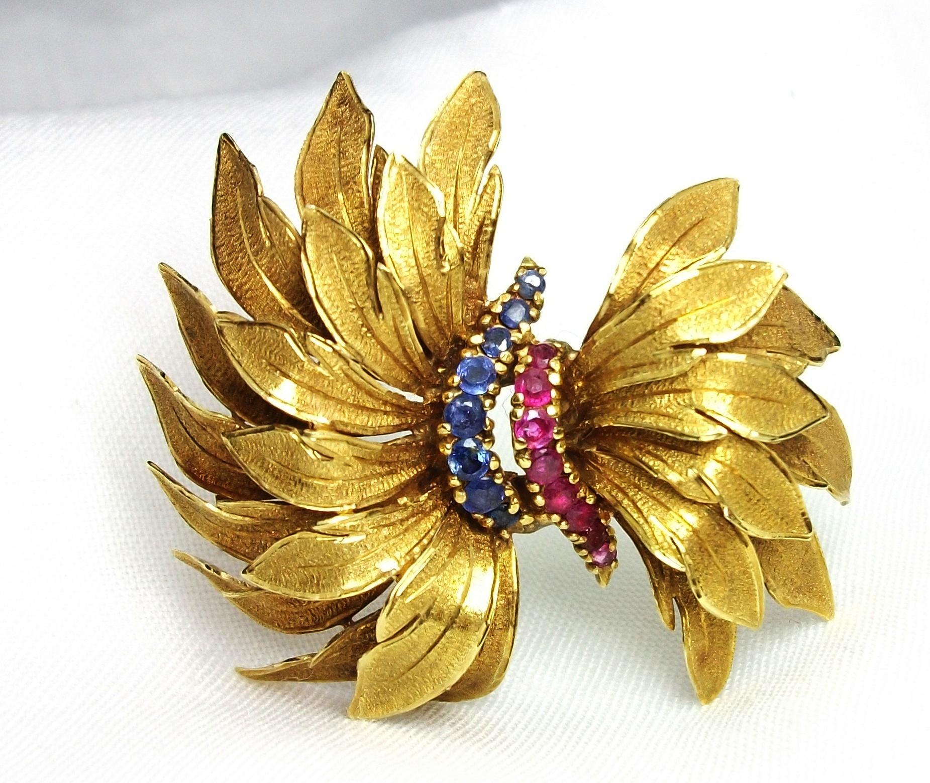 Brilliant Cut Vintage 1950s Rubies Sapphires 18 Karat Yellow Gold Bow Brooch For Sale