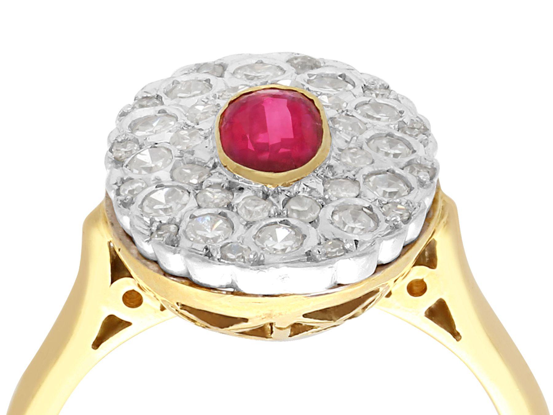 An impressive vintage 0.39Ct diamond and 0.42Ct ruby, 18k yellow gold and 18k white gold set cluster ring; part of our vintage jewelry collections.

This fine and impressive 1950s oval cut ruby and diamond ring has been crafted in 18k yellow gold