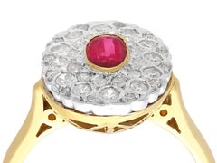 Vintage 1950s Oval Cut Ruby and Diamond 18k Yellow Gold Cluster Ring