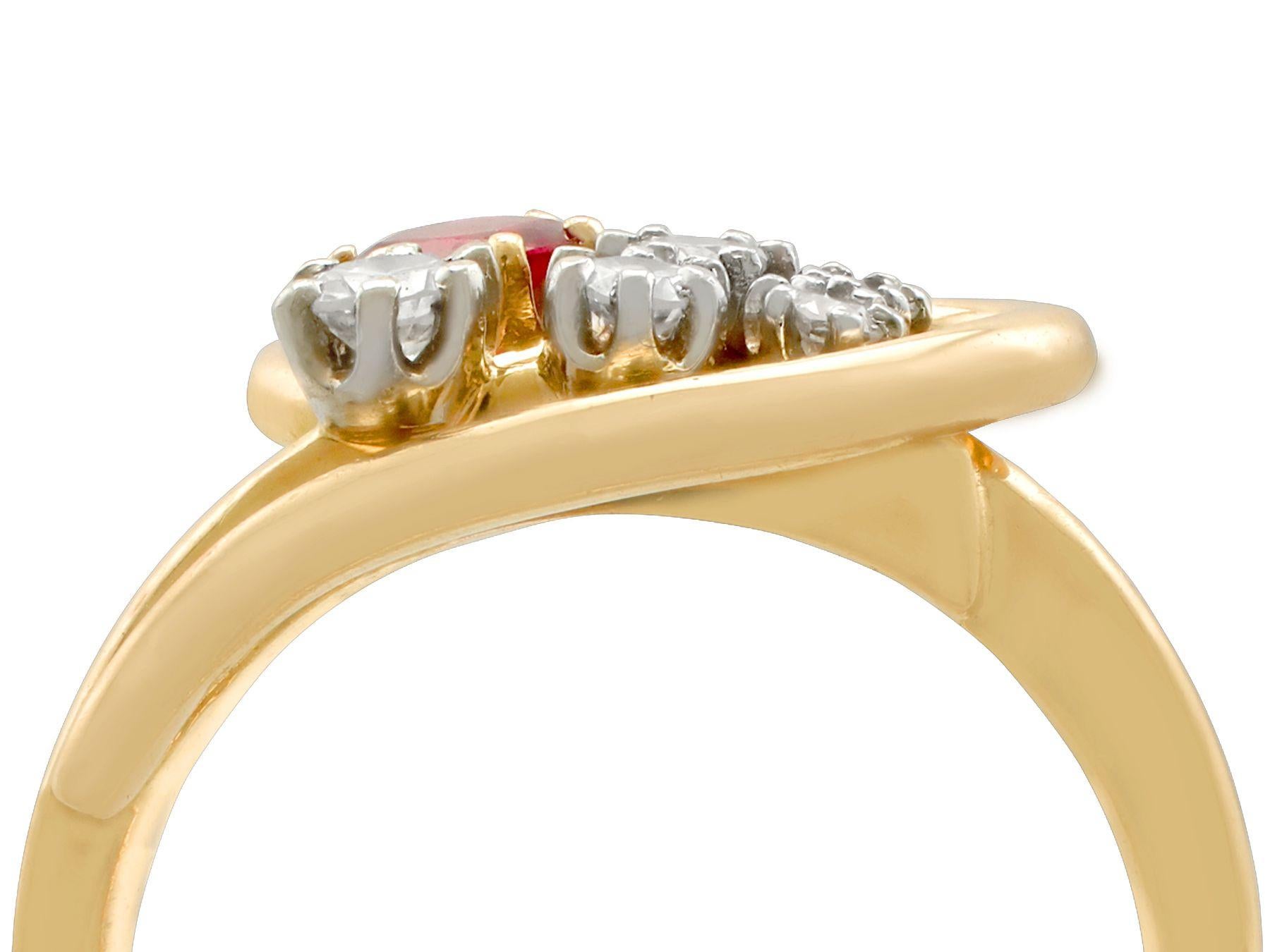 A fine and impressive vintage French 0.28 carat ruby and 0.30 carat diamond, 18 karat yellow gold and 18 karat white gold set twist / dress ring; part of our diverse antique jewelry and estate jewelry collections.

This fine and impressive ruby ring